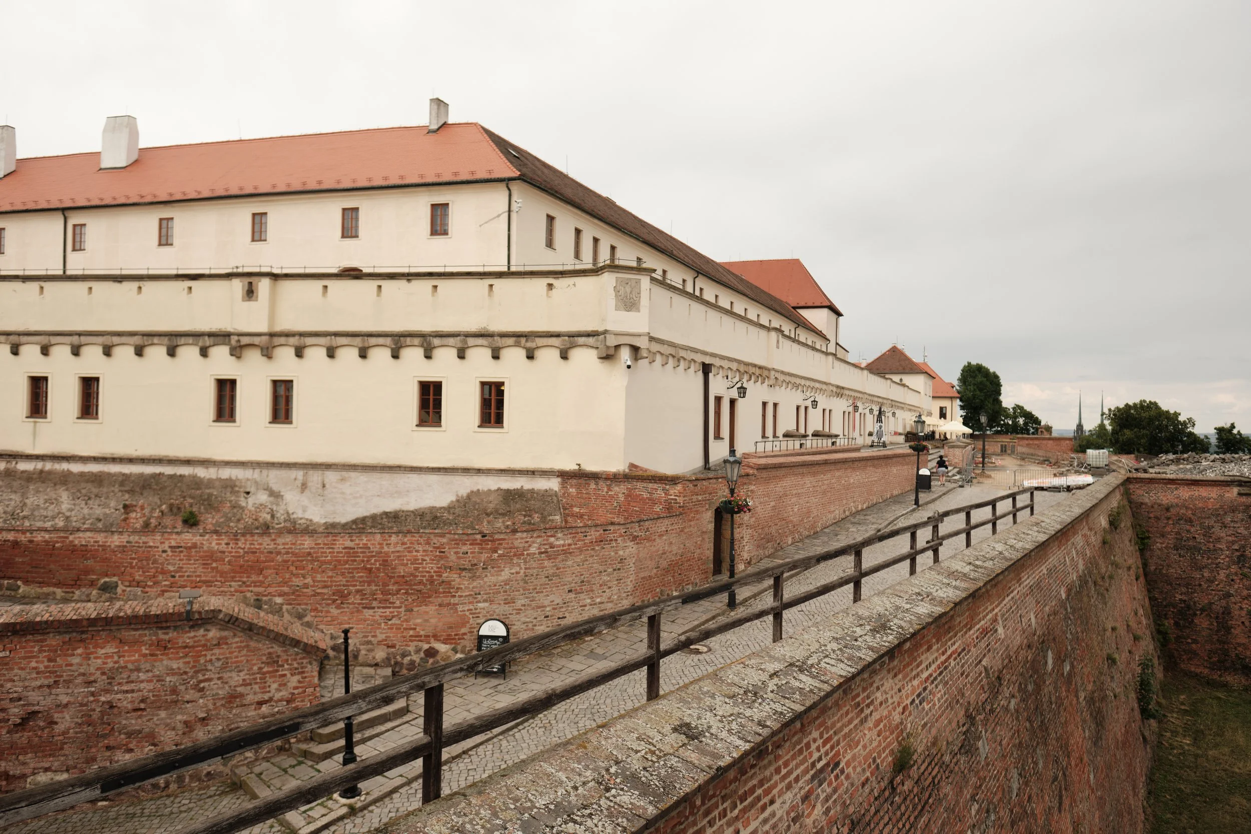 A cloudy afternoon became the perfect companion for exploring Špilberk Castle. Beyond its panoramic views over Brno, the fortress reveals another story beneath its walls—one of prison cells, underground corridors, and centuries of history. Walking th