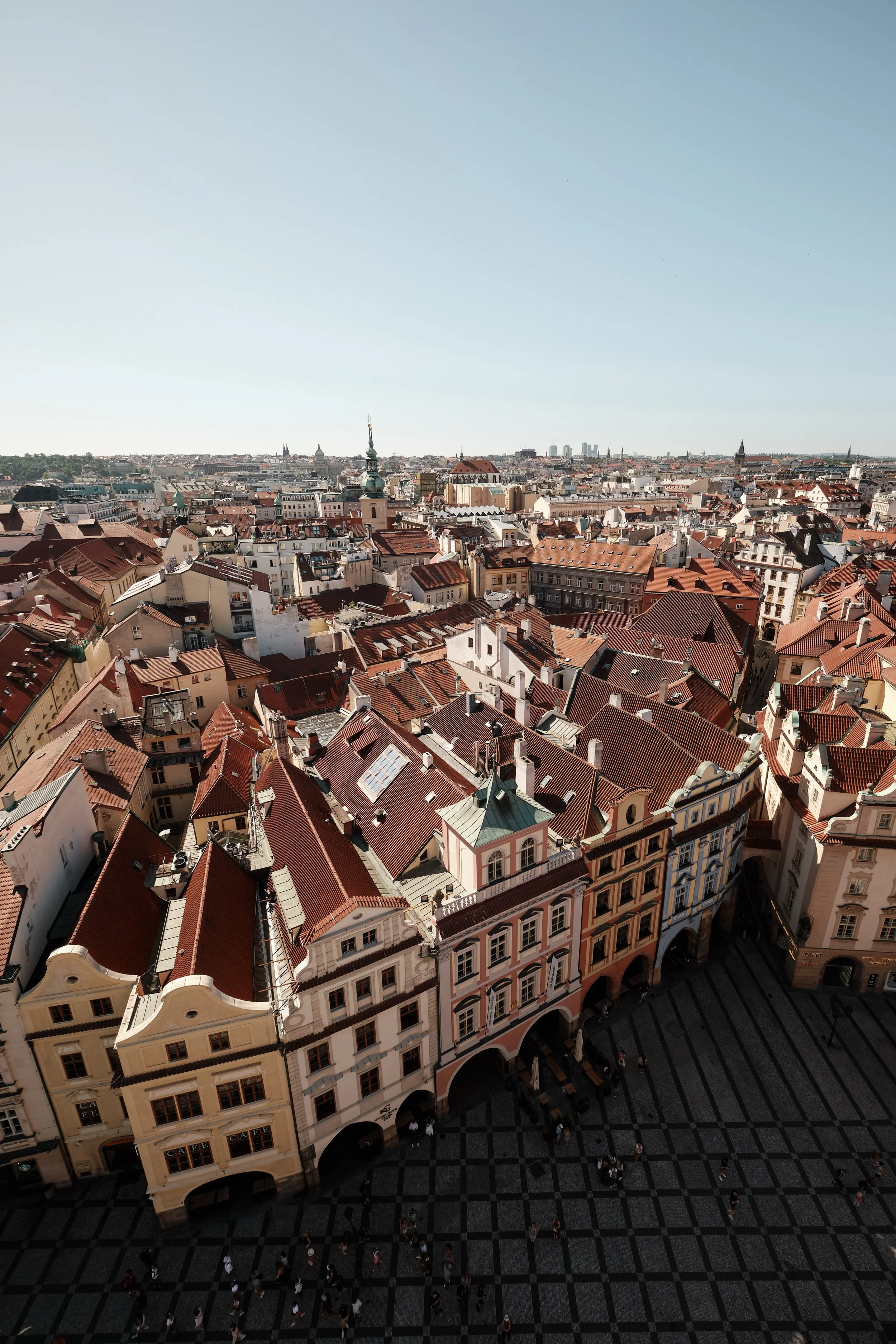 From the Old Town Hall Tower, Prague reveals itself in every direction. Terracotta rooftops, Gothic spires, grand squares, and centuries of architecture come together in a panorama that has defined the Czech capital for generations.