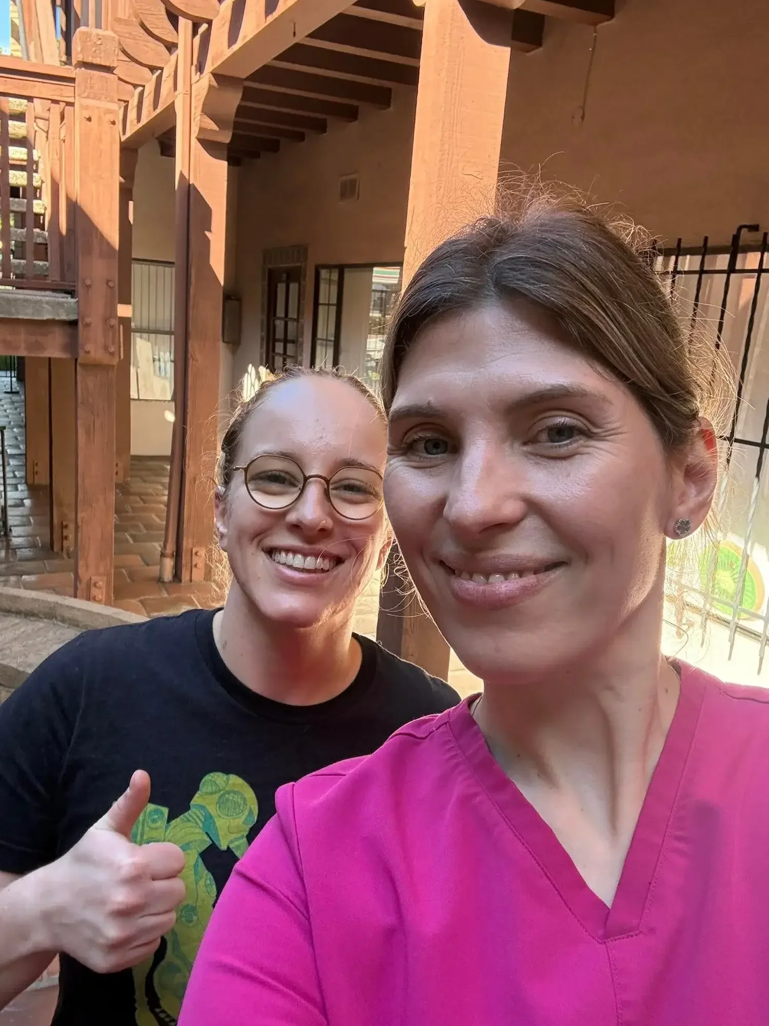A woman and her esthetician smiling at Kiwi Spa