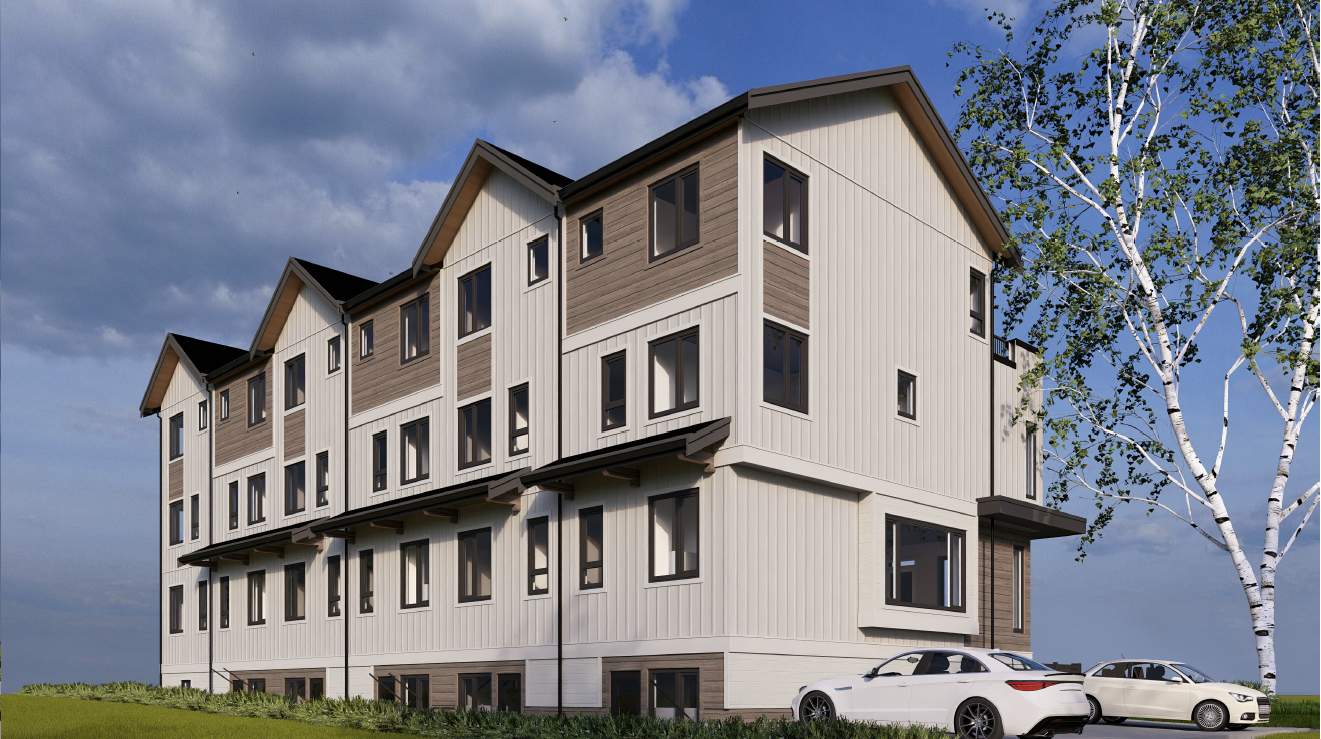 A modern four-story residential building with white and brown exterior siding, multiple windows, and parked cars in front, under a partly cloudy sky with a large tree to the right.