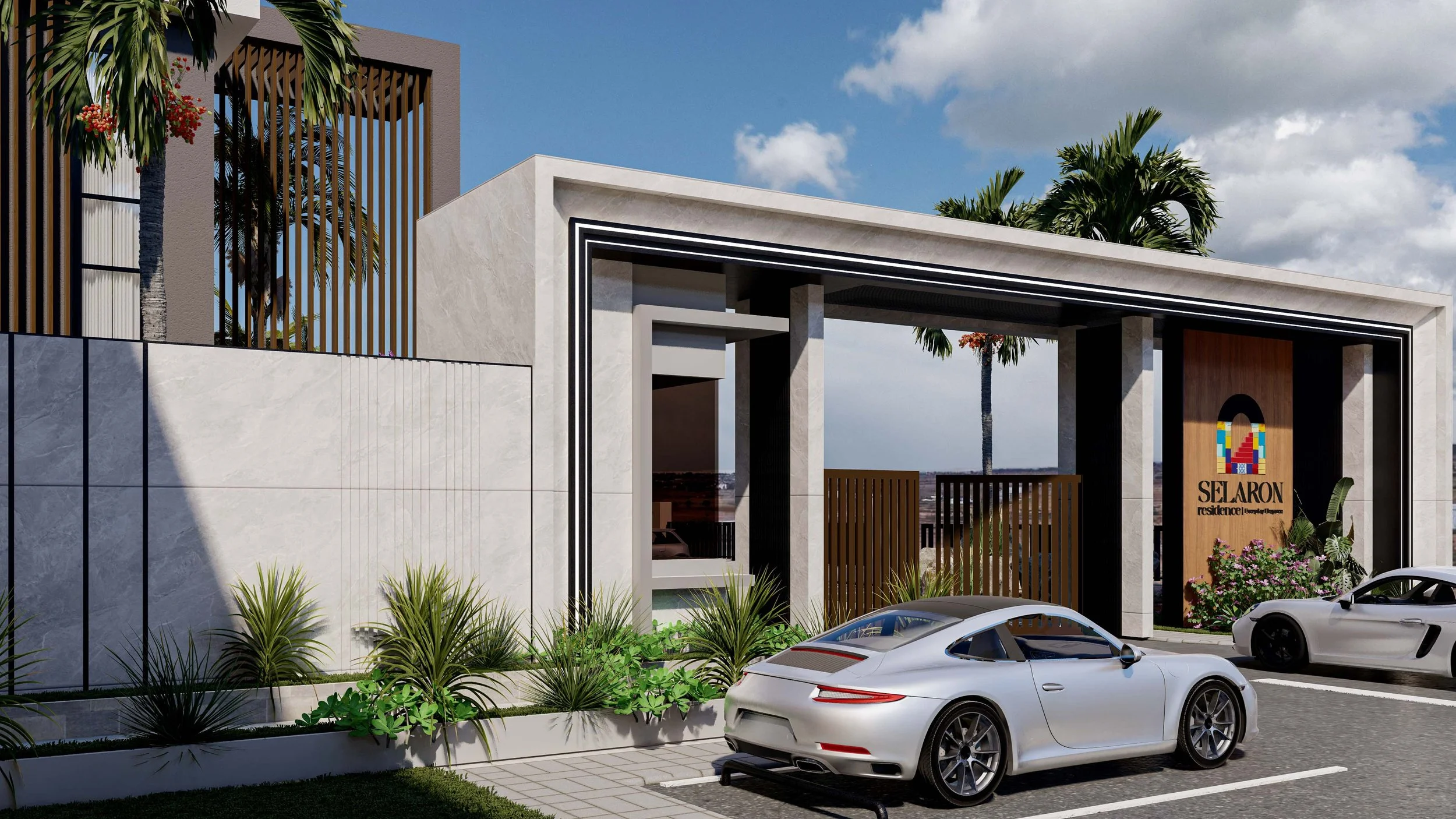 Entrance of a modern residential complex with a white sports car parked in front, tropical plants, palm trees, and a sign reading 'SELARON residential'.