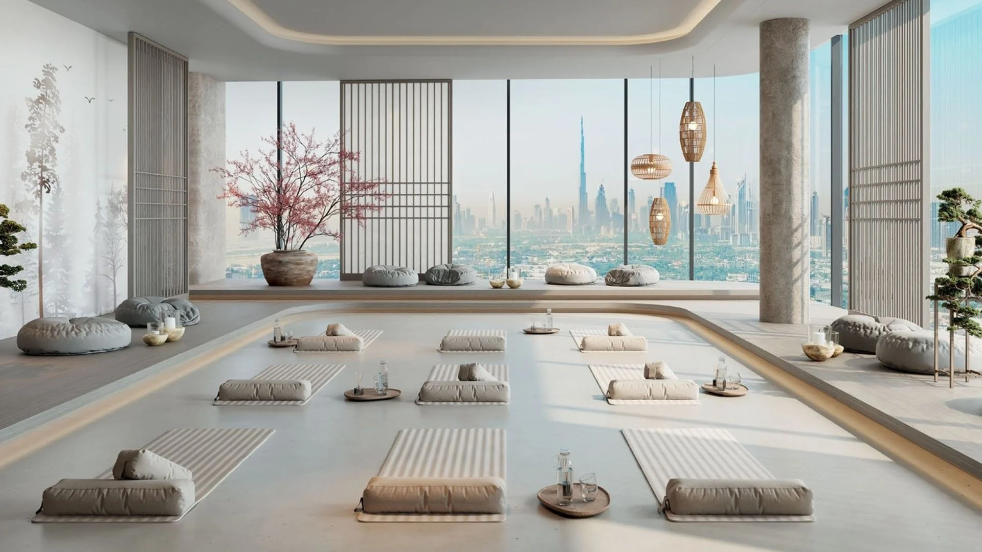 A modern, minimalist meditation room with floor cushions, small trays with drinks, large potted cherry blossom, bonsai trees, paper lanterns, and a city skyline view through large windows.