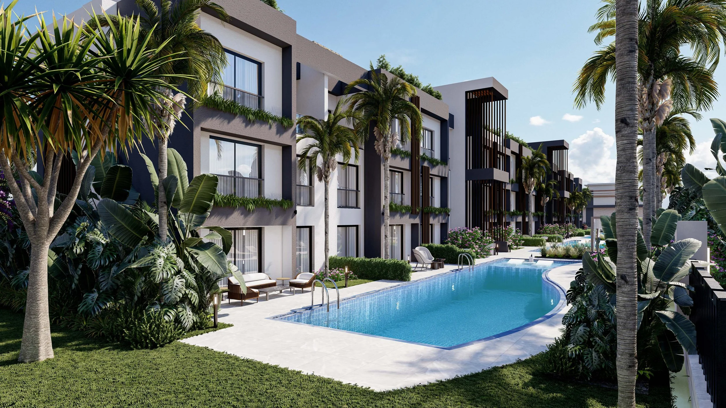 Modern apartment complex with balconies, surrounded by lush palm trees and plants, featuring a large outdoor swimming pool with lounge chairs.