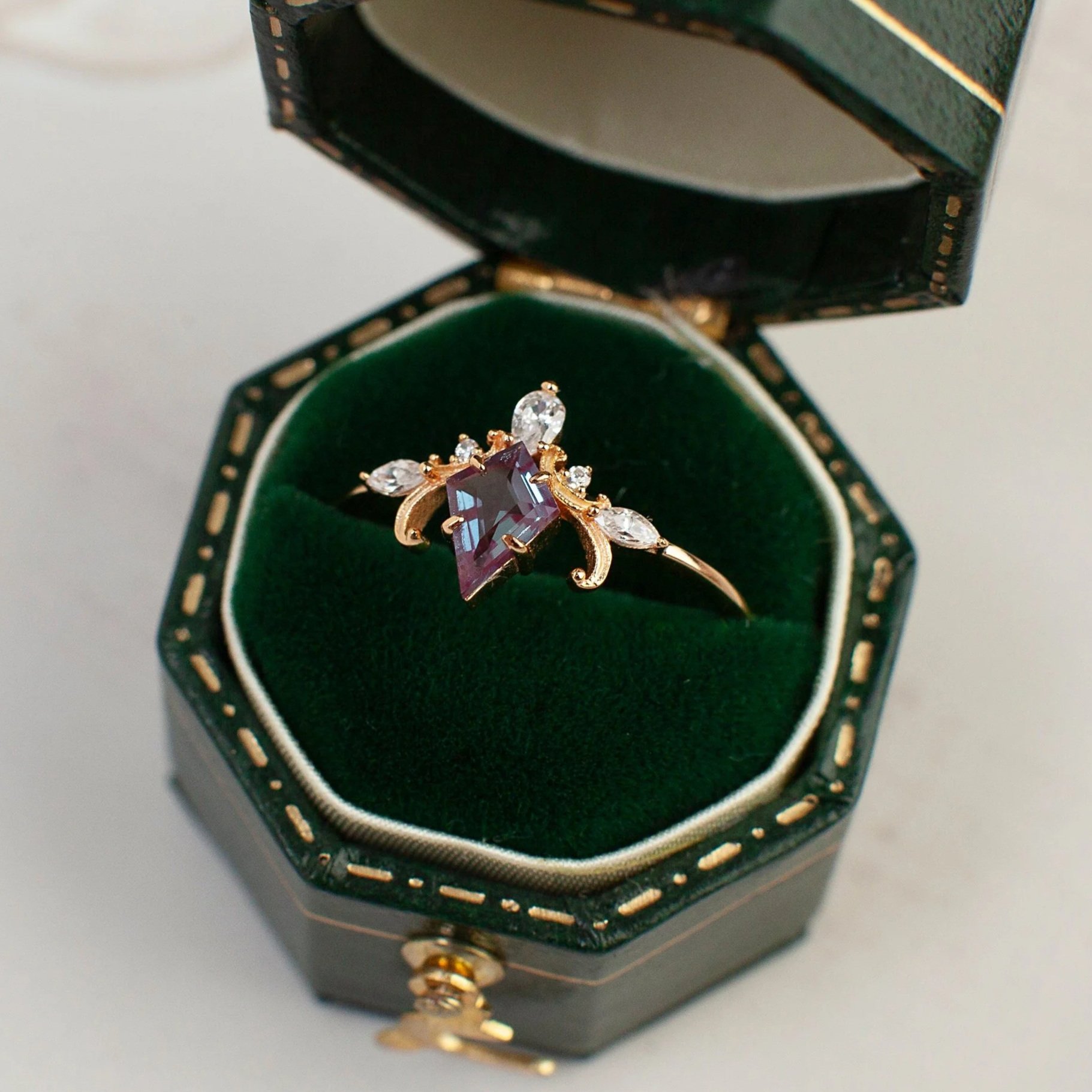 Vintage-inspired Alexandrite ring featuring a kite-cut color-changing gemstone with Art Deco detail. A unique, elegant ring for everyday wear or a meaningful gift.