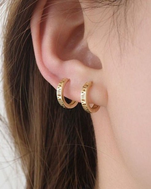 gold+roman+numeral+geometric+gold+huggie+hoop+earrings.jpg