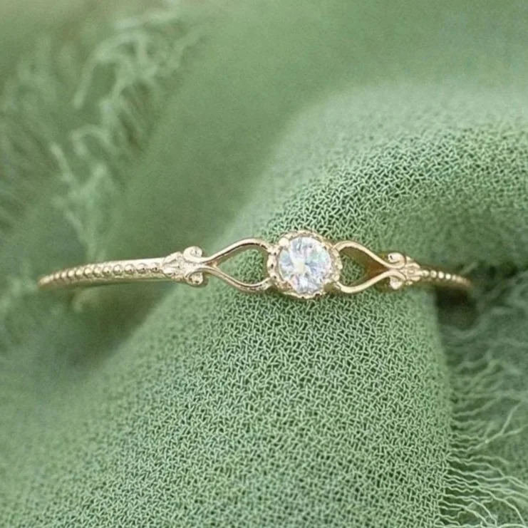 Vintage-inspired delicate crystal ring with a slim band and soft sparkle. Perfect for stacking, everyday elegance, and thoughtful gifting.