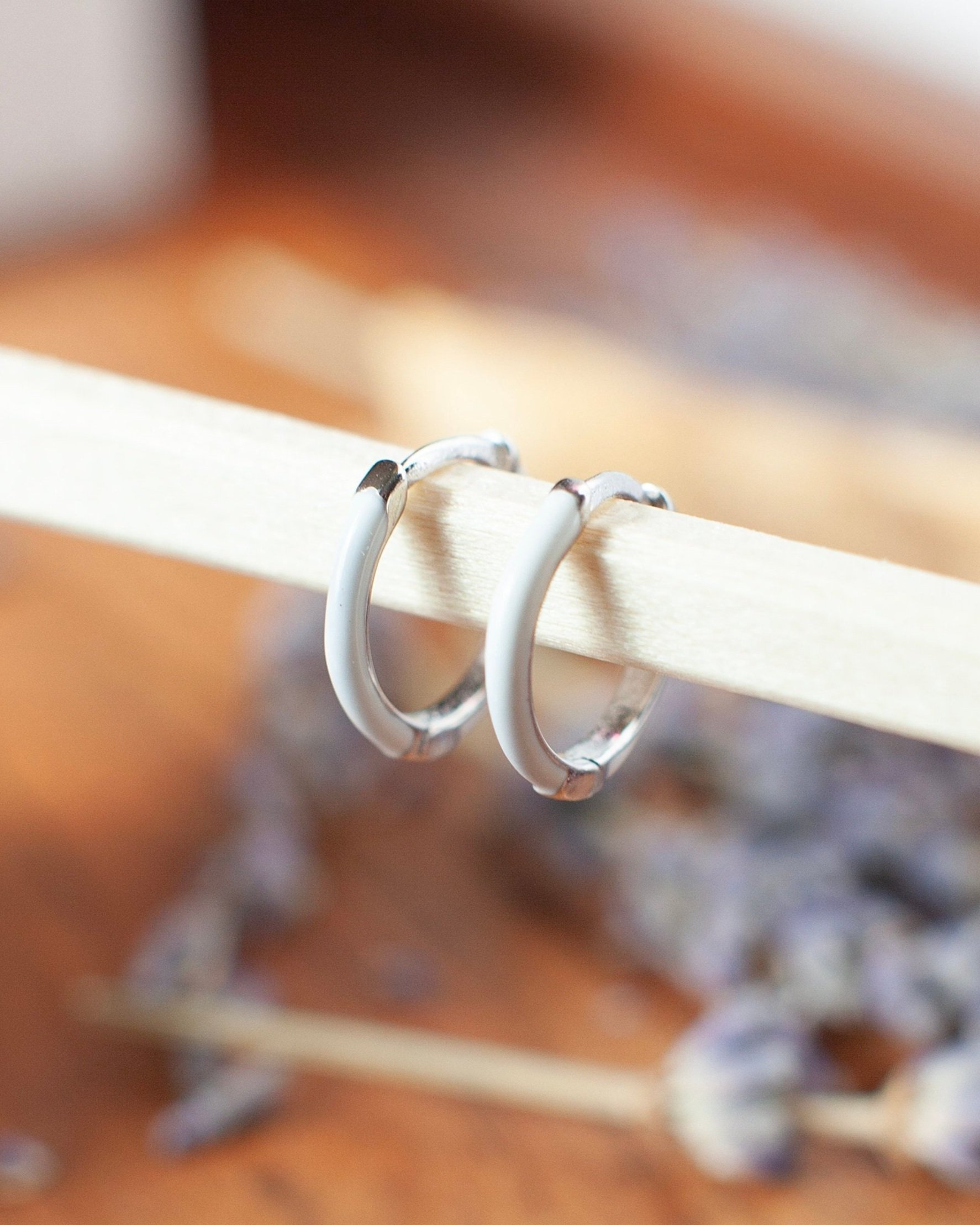 white+second+hole+huggie+hoop+earrings+5.jpg