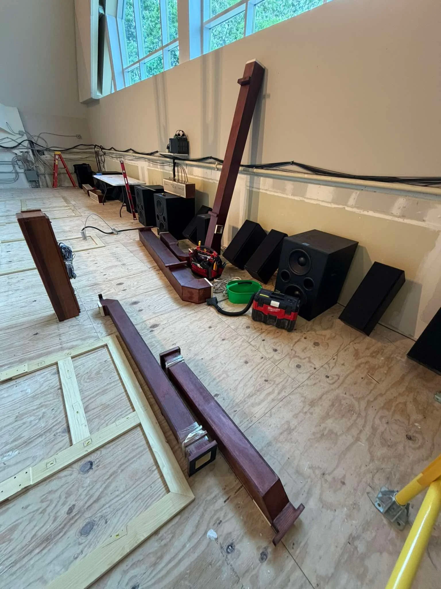 Windlines are brought up.  The Rodgers speakers and subwoofers have been installed against the rear wall.
