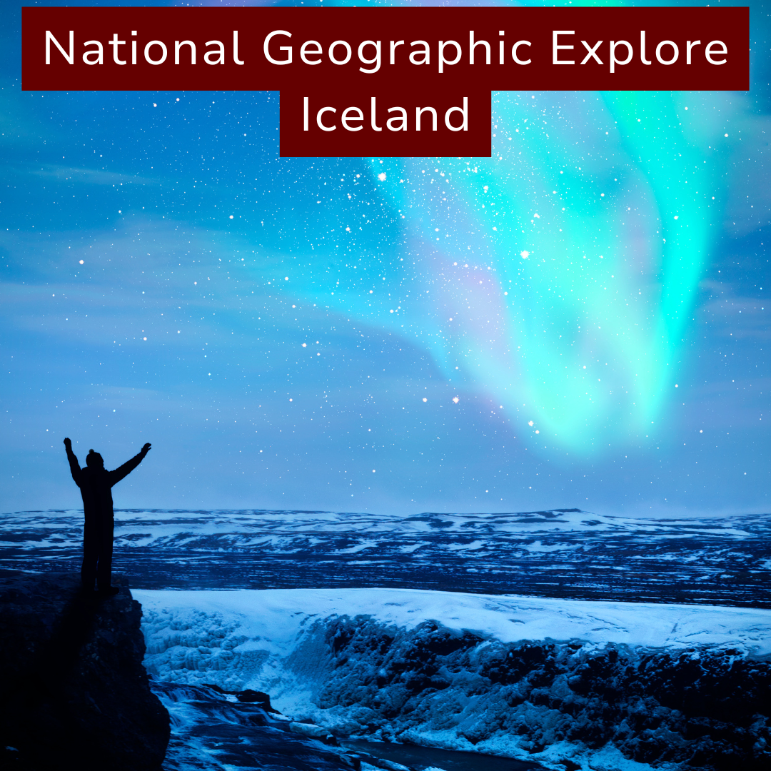 Person standing on a rock overlooking icy landscape with the Northern Lights and starry sky in Iceland.