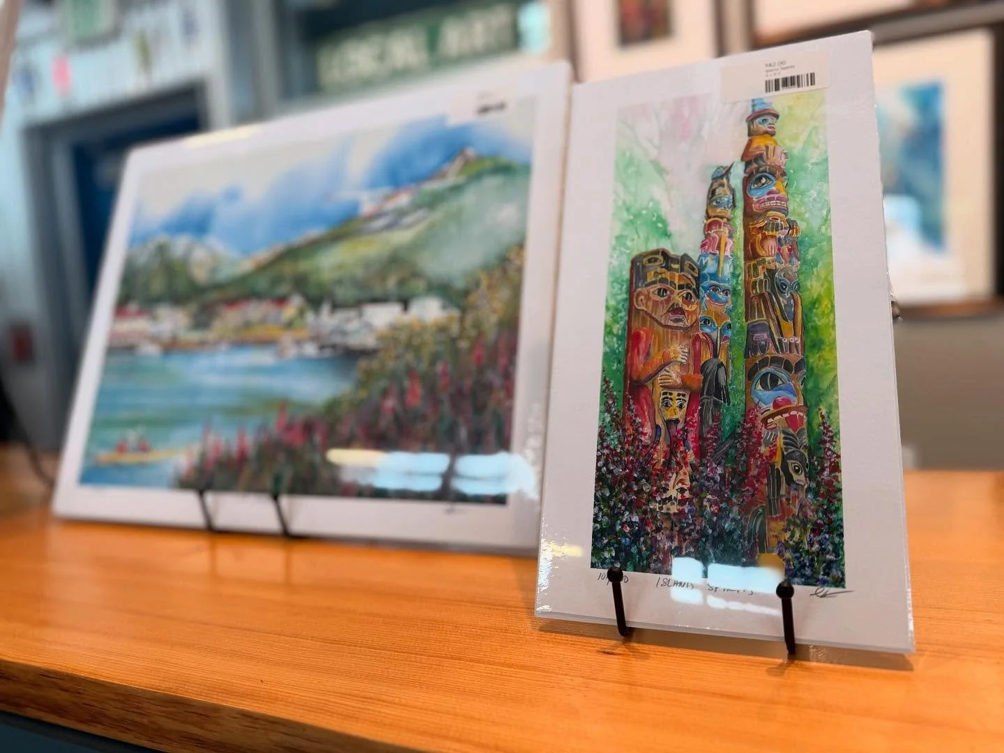 History meets watercolor magic! 🪾✨🎨
&ldquo;Island Spirits&rdquo; by Keith Greba turns a Sitka classic, into a timeless piece. This one is favored by many and is always up on display at our gallery. Don&rsquo;t miss it before the season&rsquo;s over