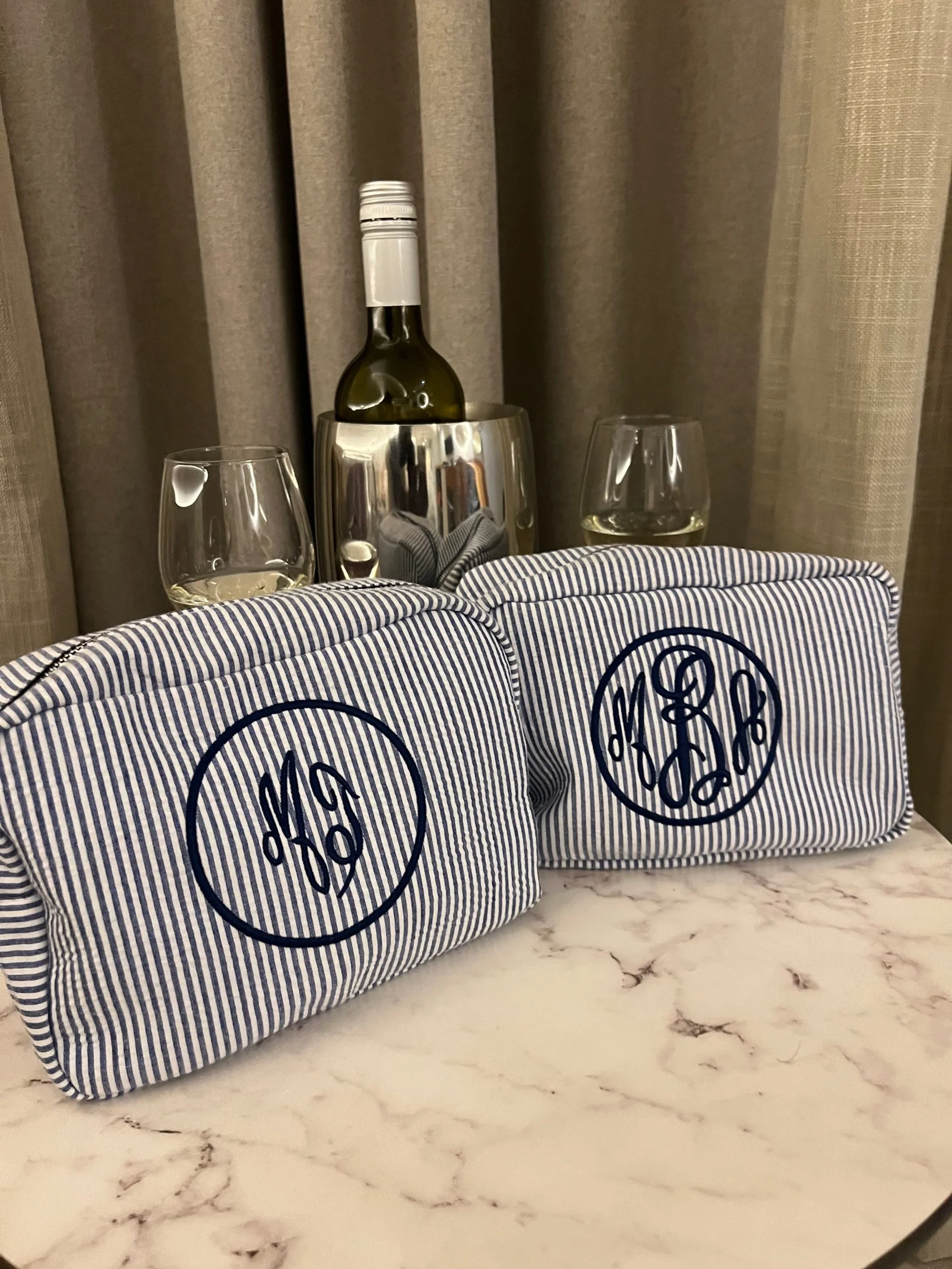 Personalized monogram embroidery on cosmetic bags - perfect for gifts and bridal parties.