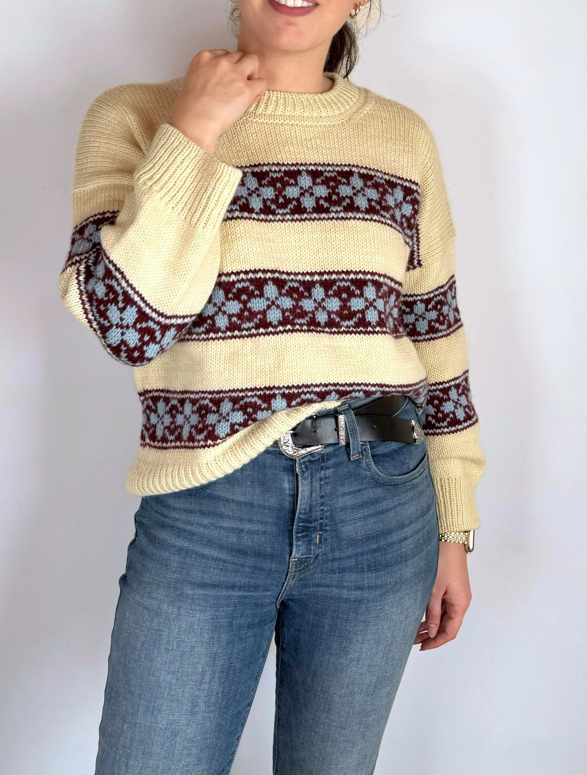 hilda sweater in yellow base with colorwork stripes in burgundy, and flowers in light blue