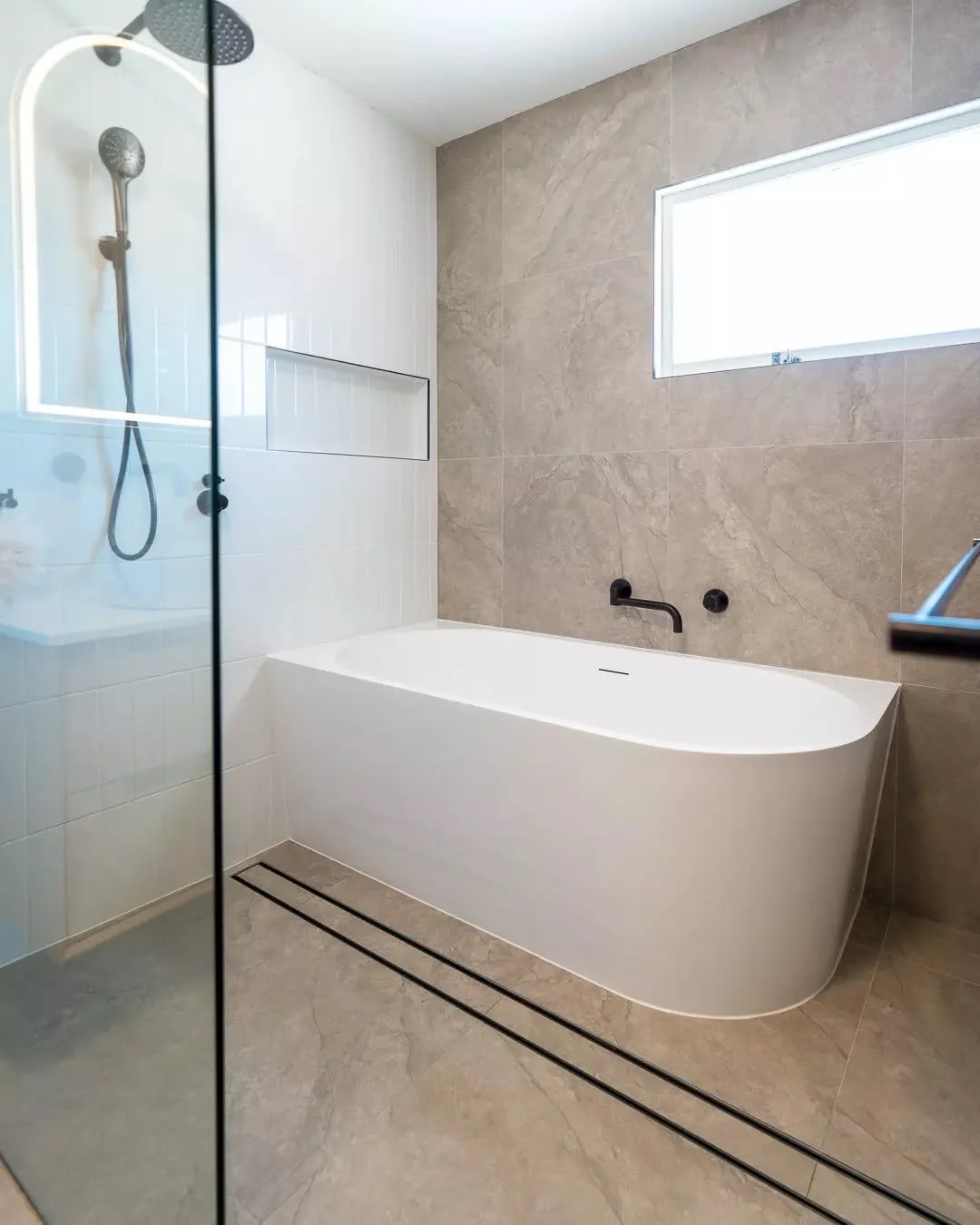 Freestanding bath, walk-in shower and not a wasted inch&hellip;This is a great example of why wet rooms are so popular, layouts like this make a huge difference. #bathroomreno #modernbathroom #wetrppm #renovationproject #bathroominspo