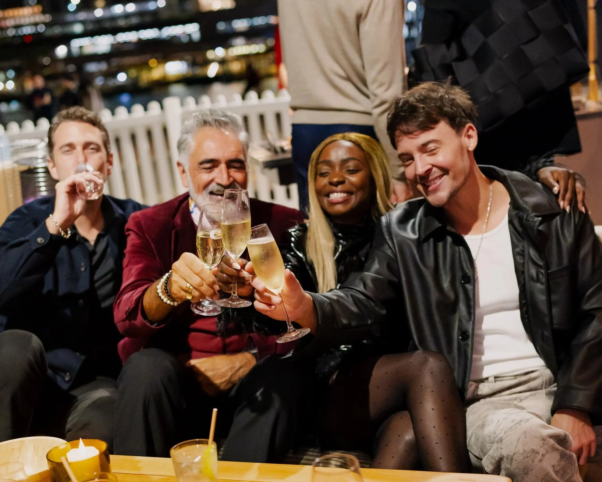 Friends Celebrating a Birthday at Cruise Bar &amp; Restaurant