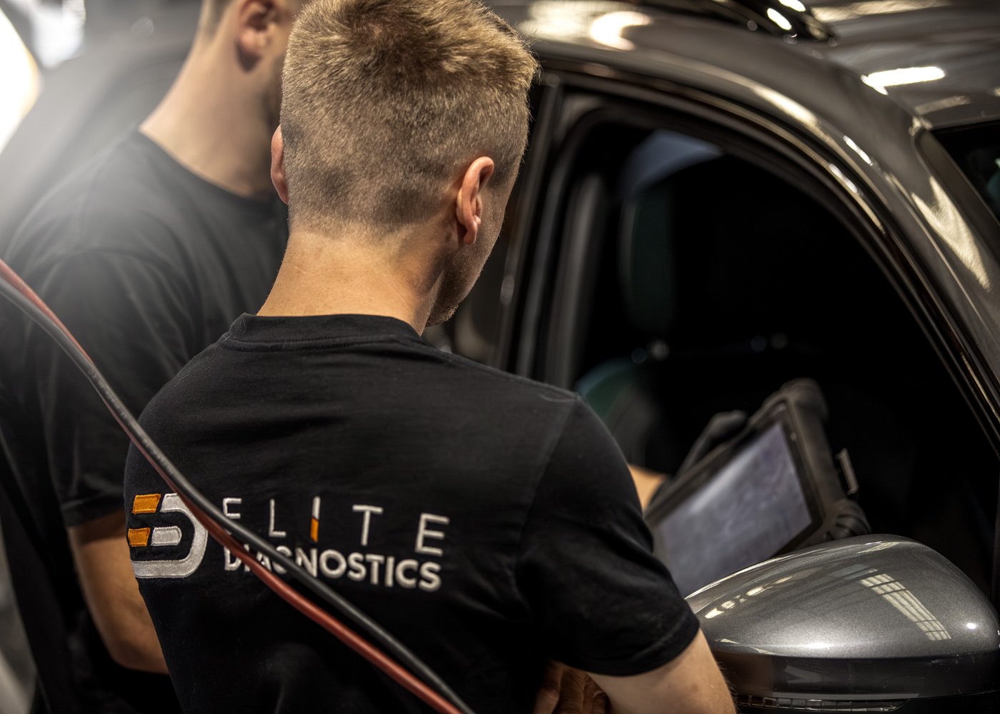 Mechanics looking at ADAS calibration