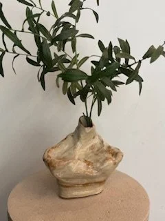 Embrace: Earthenware, hand-coiled vessel, sculpted to evoke an embrace.