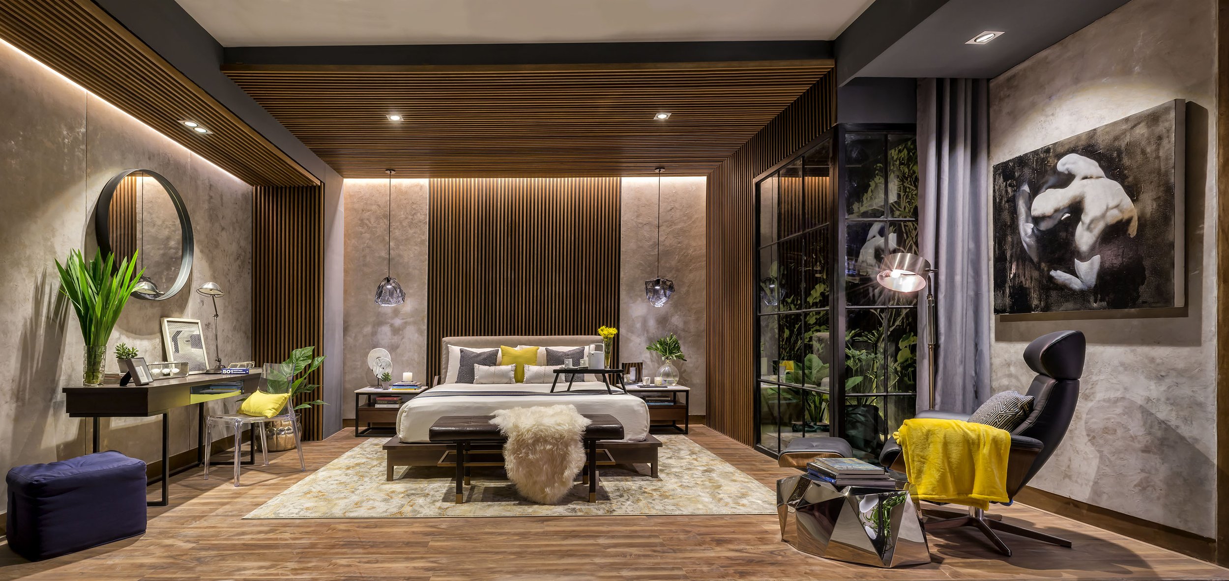 Modern bedroom with a bed, nightstands, artwork, and large window with view of plants.