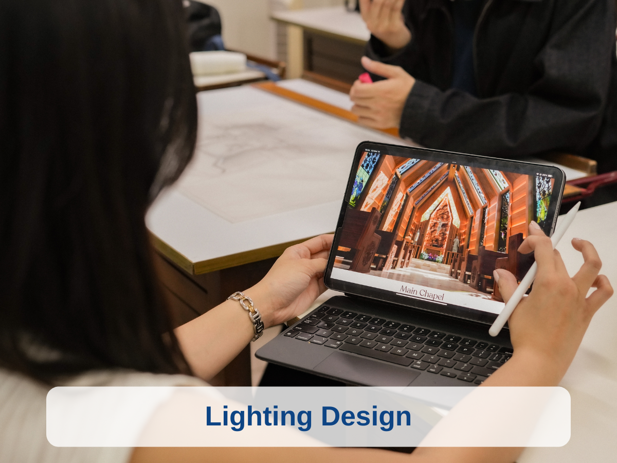 Person showing a digital image of a church's interior with warm lighting design on a tablet, with the text 'Main Chapel' and a label 'Lighting Design'.