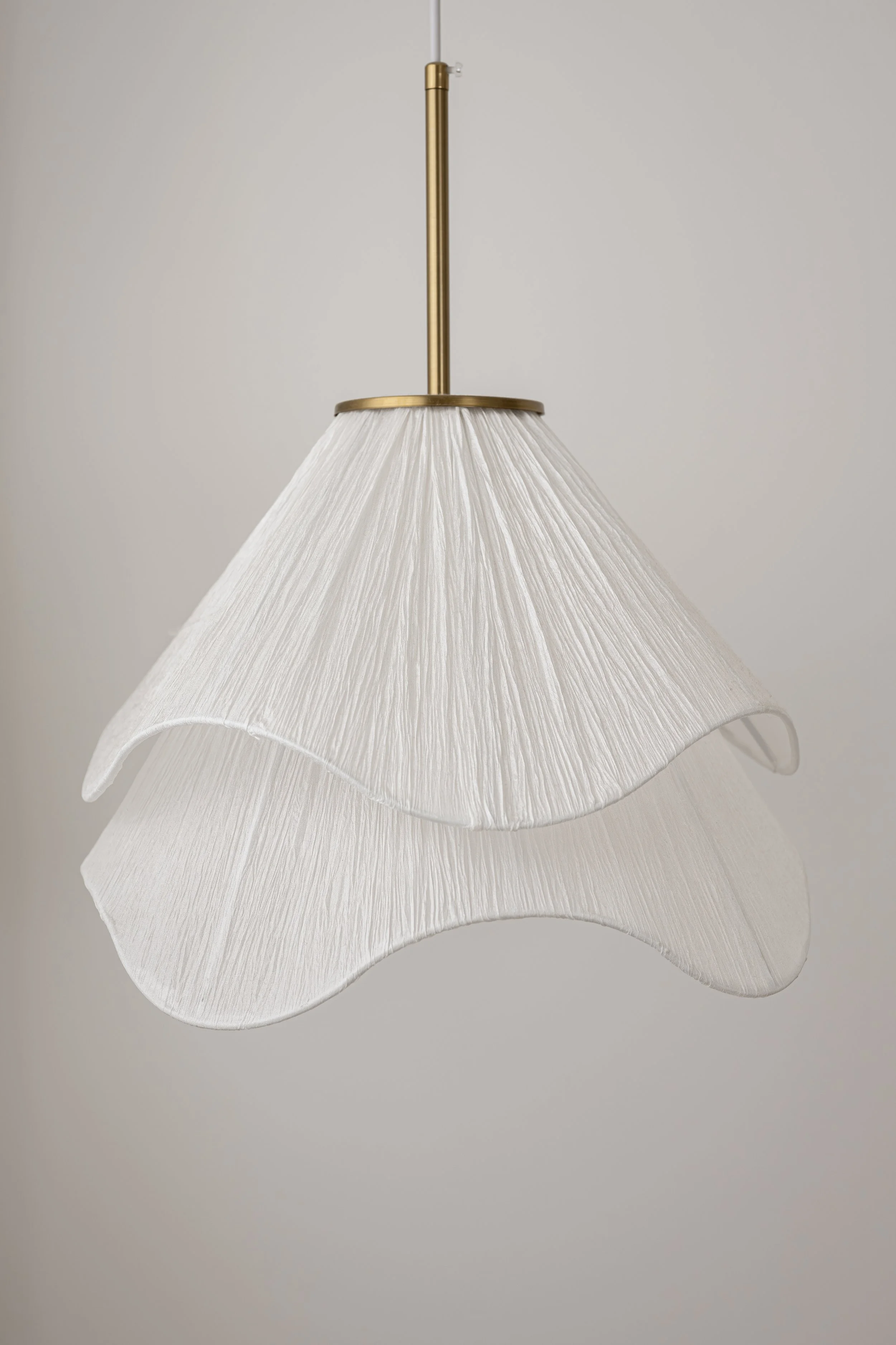 Pleated fabric pendant light with a wavy double-tier shade, Glenelg Retreat, Young & Co Interiors