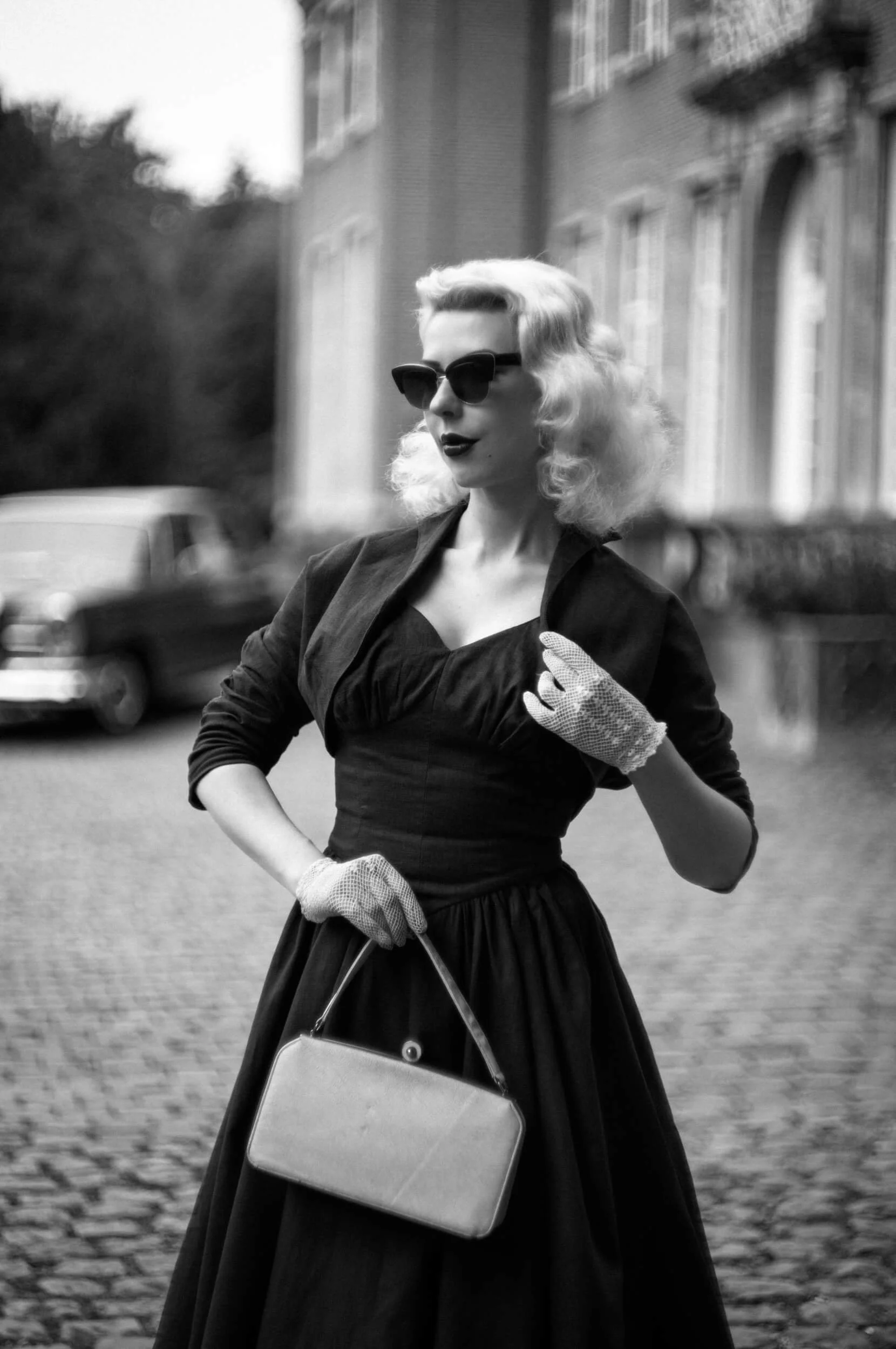 Yulia in vintage dress and sunglasses photographed with the Light Lens Lab 75mm f/1.5 Z21