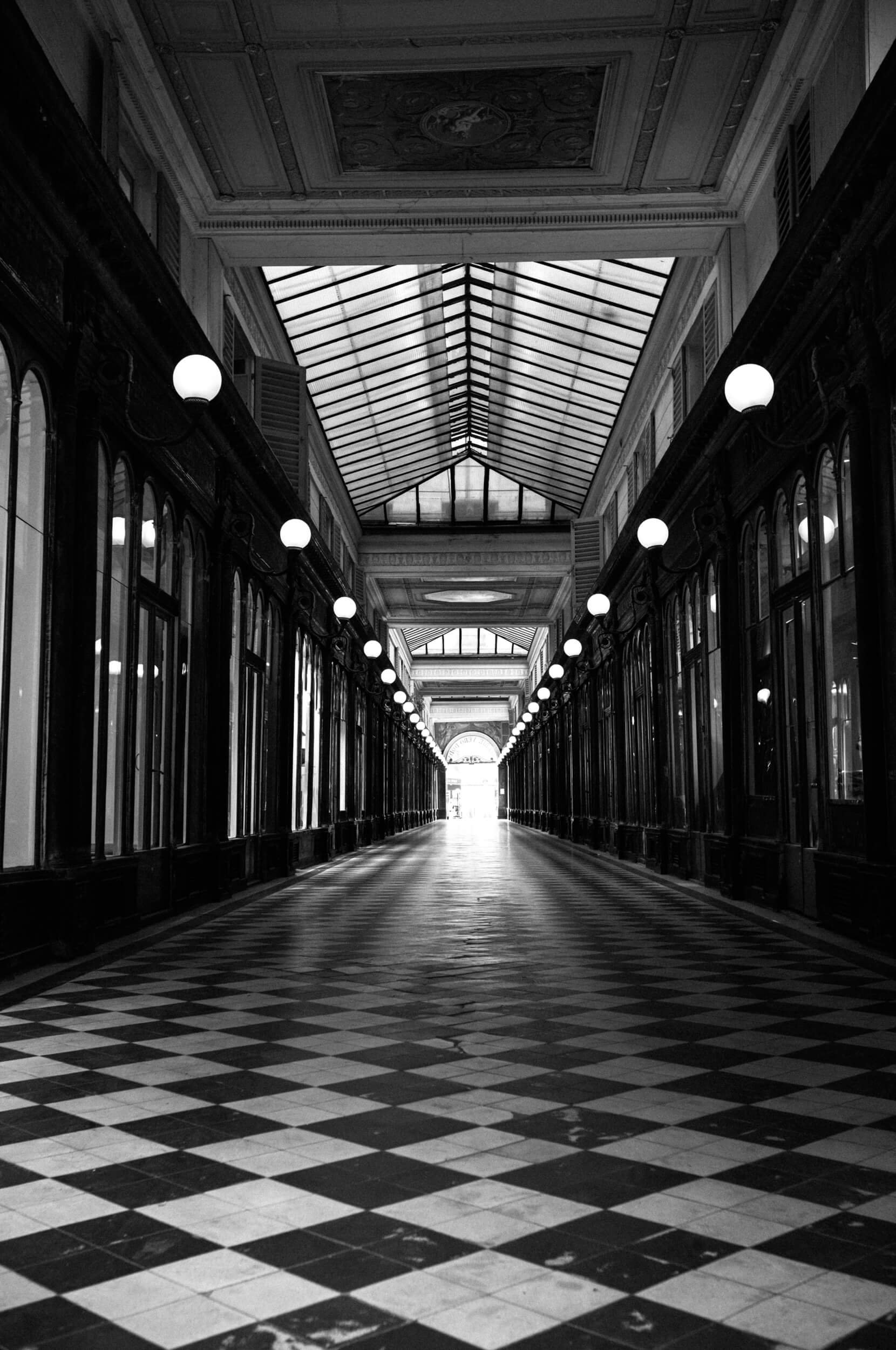 Paris covered passage in black and white photographed with Leica M11 Monochrom and Mandler 35mm f/2