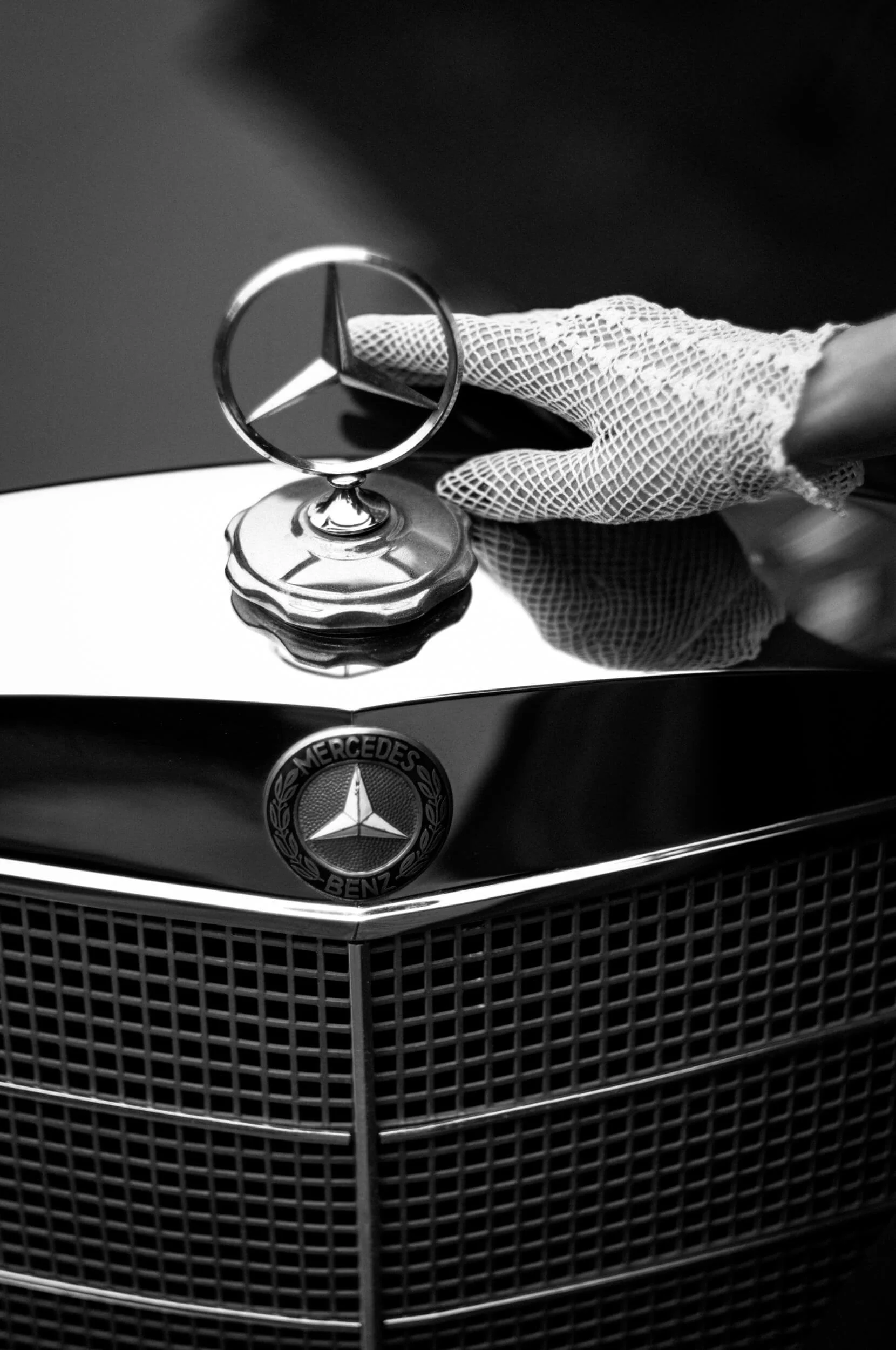Mercedes-Benz hood ornament and vintage glove photographed with the Light Lens Lab 75mm f/1.5 Z21