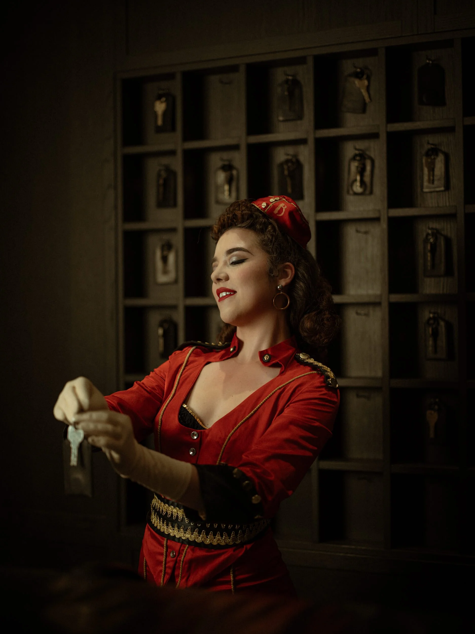 Jennifer dressed as a hotel bellwoman at Hotel August