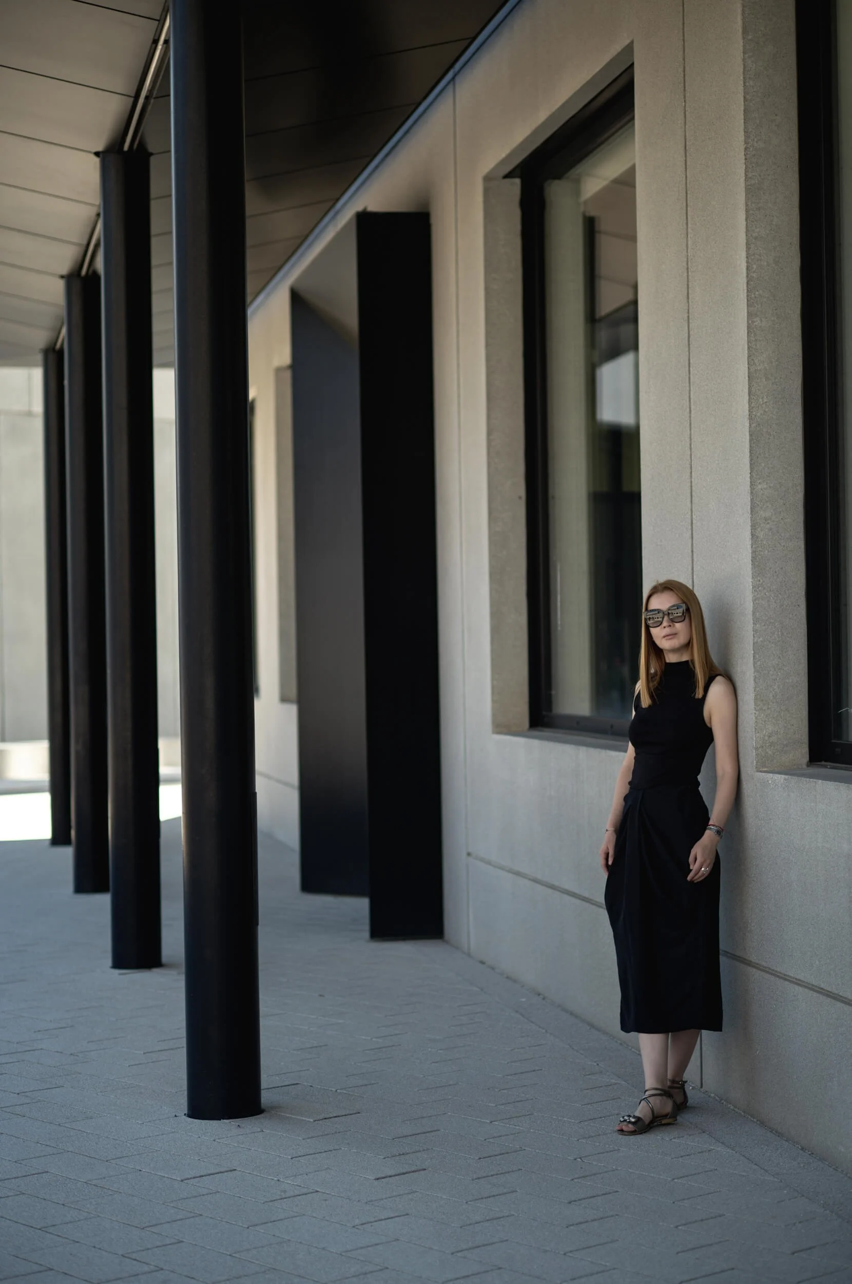 Aliya photographed against the Bauhaus-inspired architecture of Leitz Park in Wetzlar using the Leitz Summicron-M 66 f/2.
