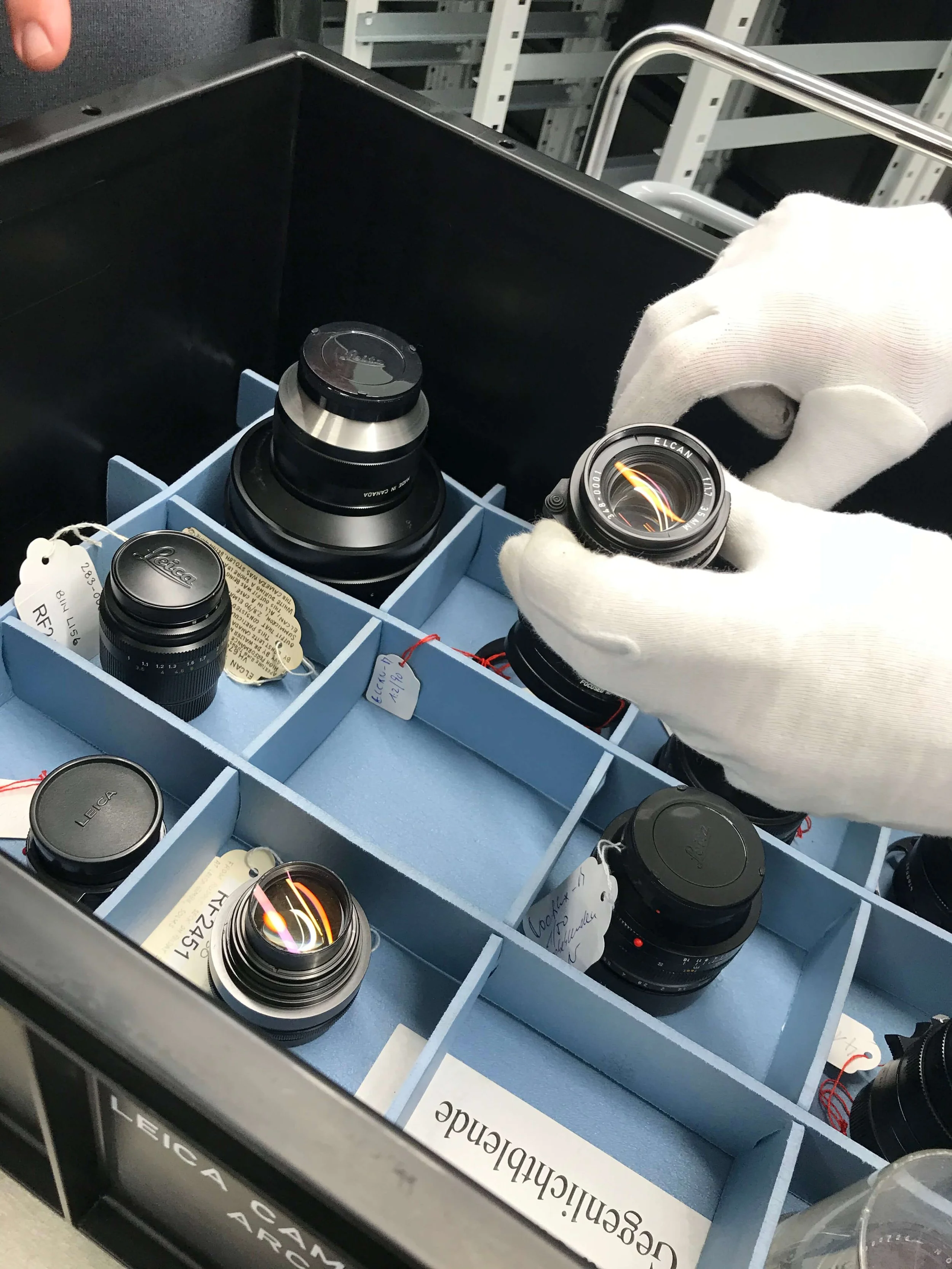 The original ELCAN 66mm f/2 being examined in the Leica Archives at Leitz Park in Wetzlar before comparing it with the new Leitz Summicron-M 66 f/2.