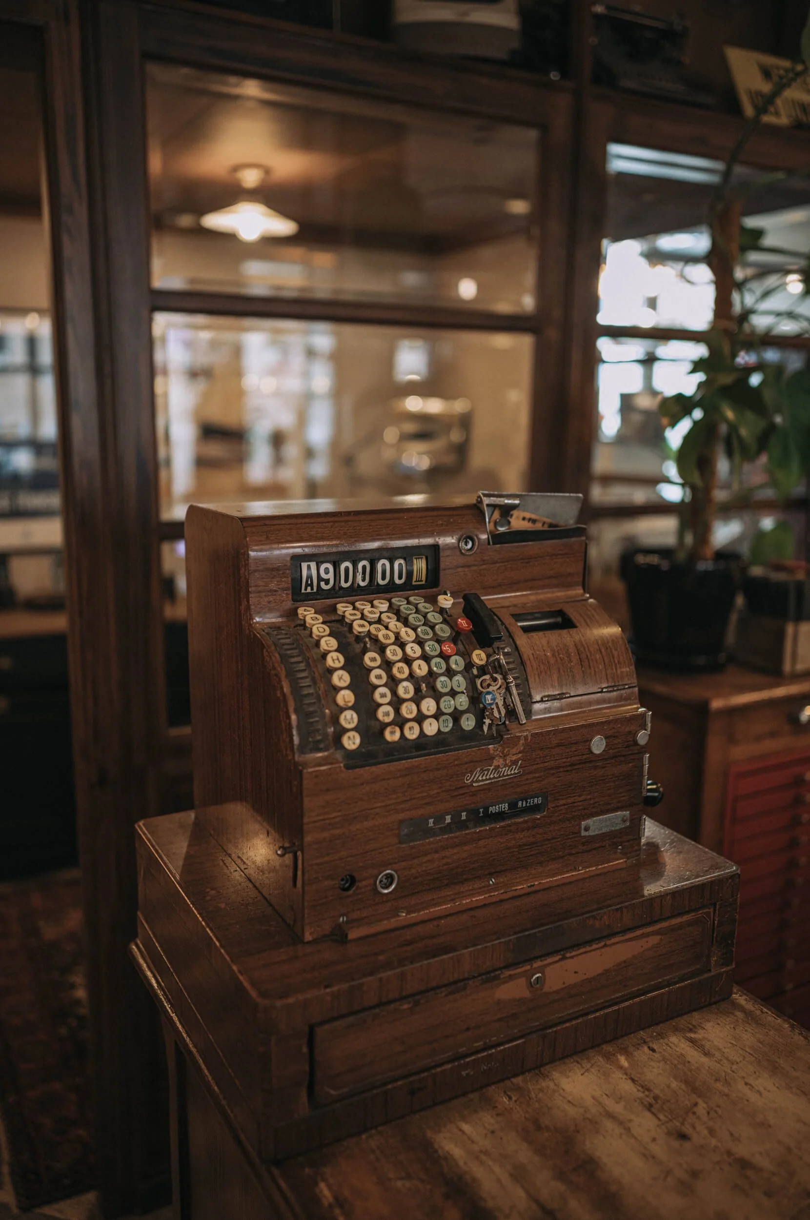 Vintage cash register detail shot with Thypoch Simera 28mm f/1.4 II close focusing Leica M11-D