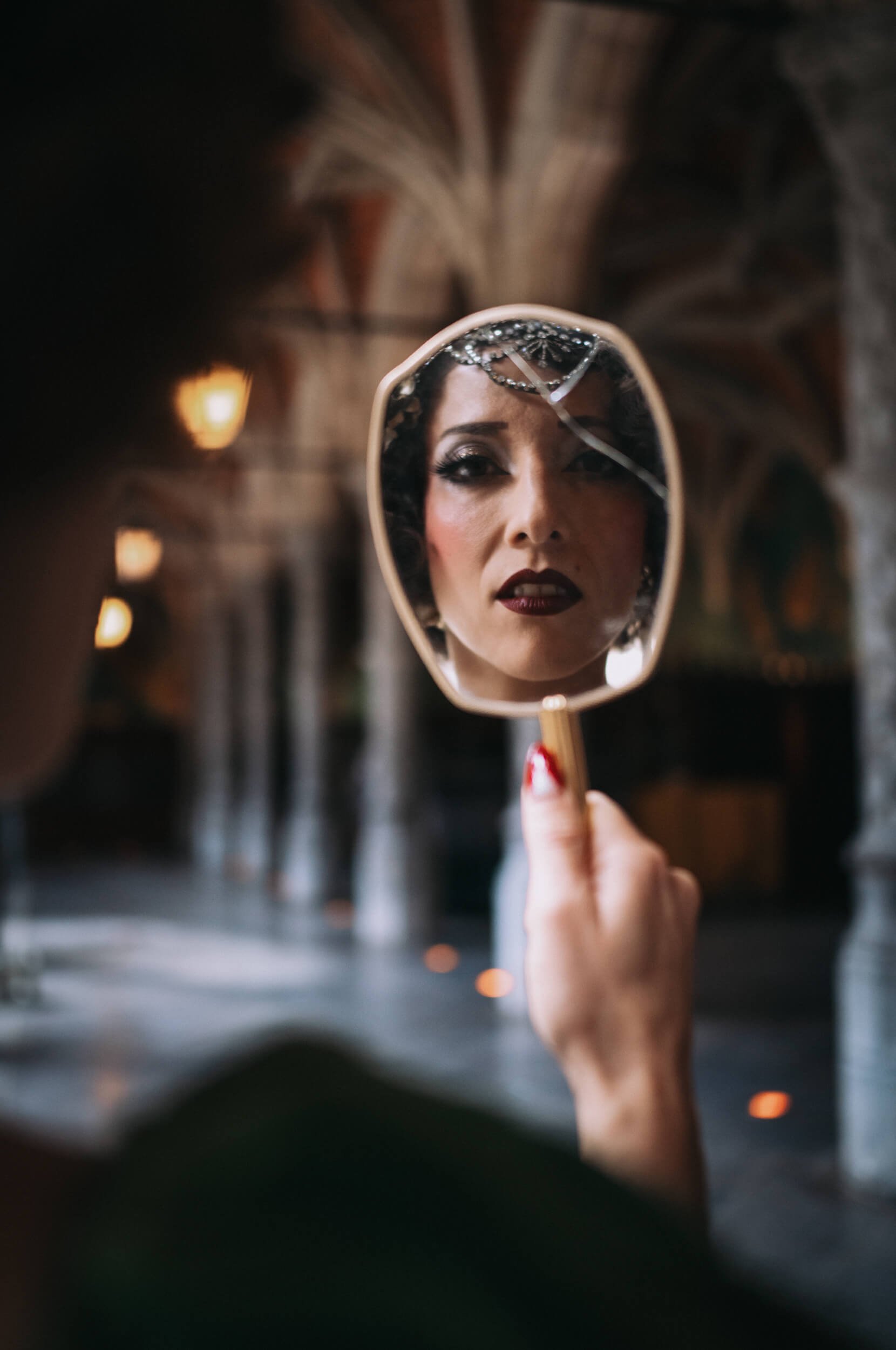 Portrait reflected in a handheld mirror photographed with the Thypoch Ksana 35mm f/2.