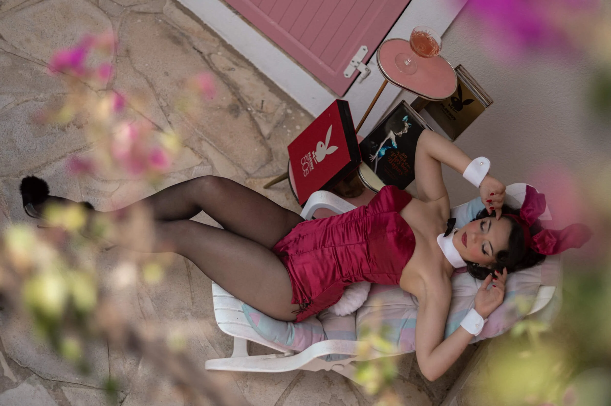Overhead pink aesthetic portrait photographed with the Light Lens Lab 75mm f/2 SPII on Leica M11-D
