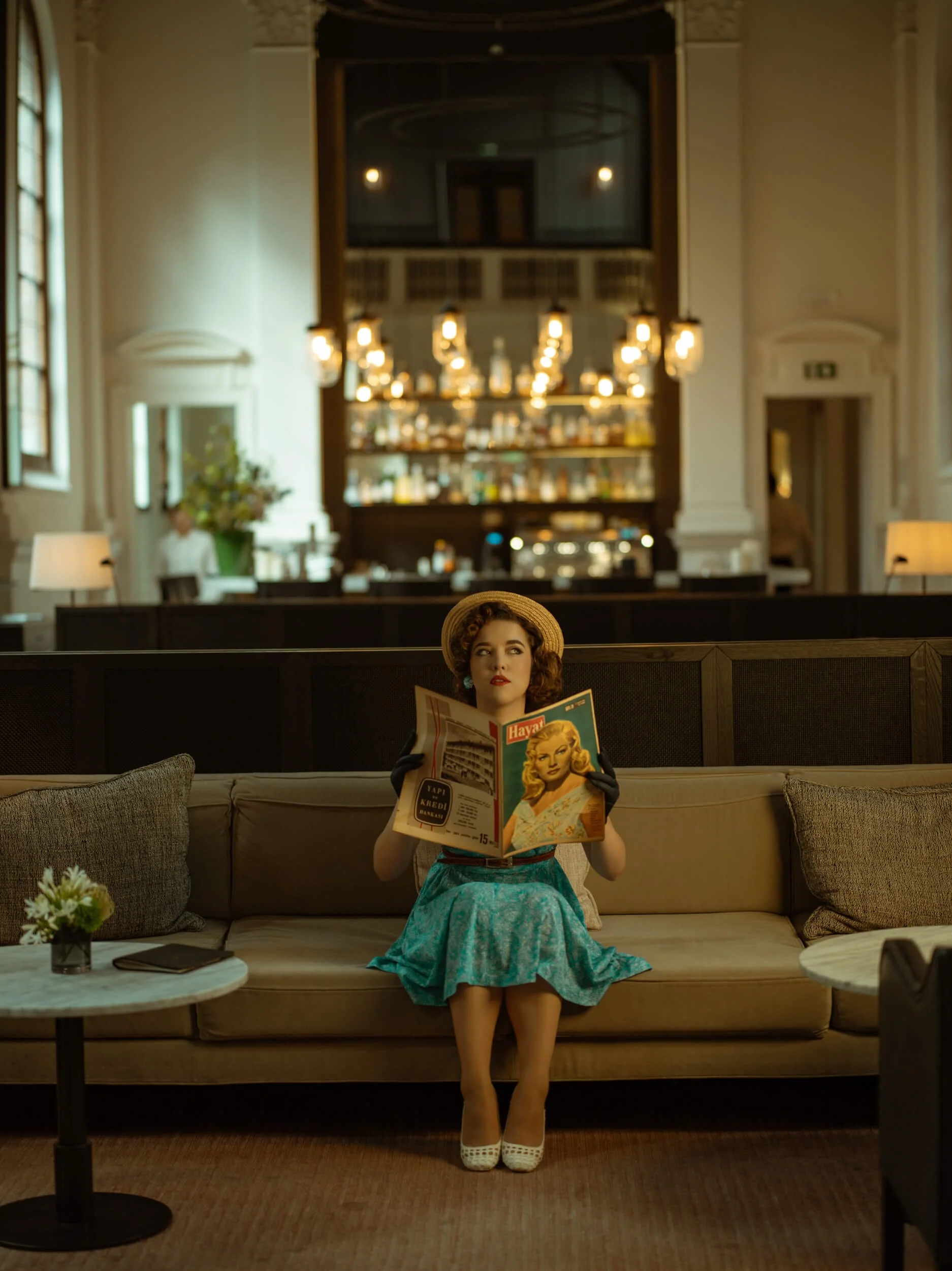 Jennifer sitting in the lobby of Hotel August in Antwerp