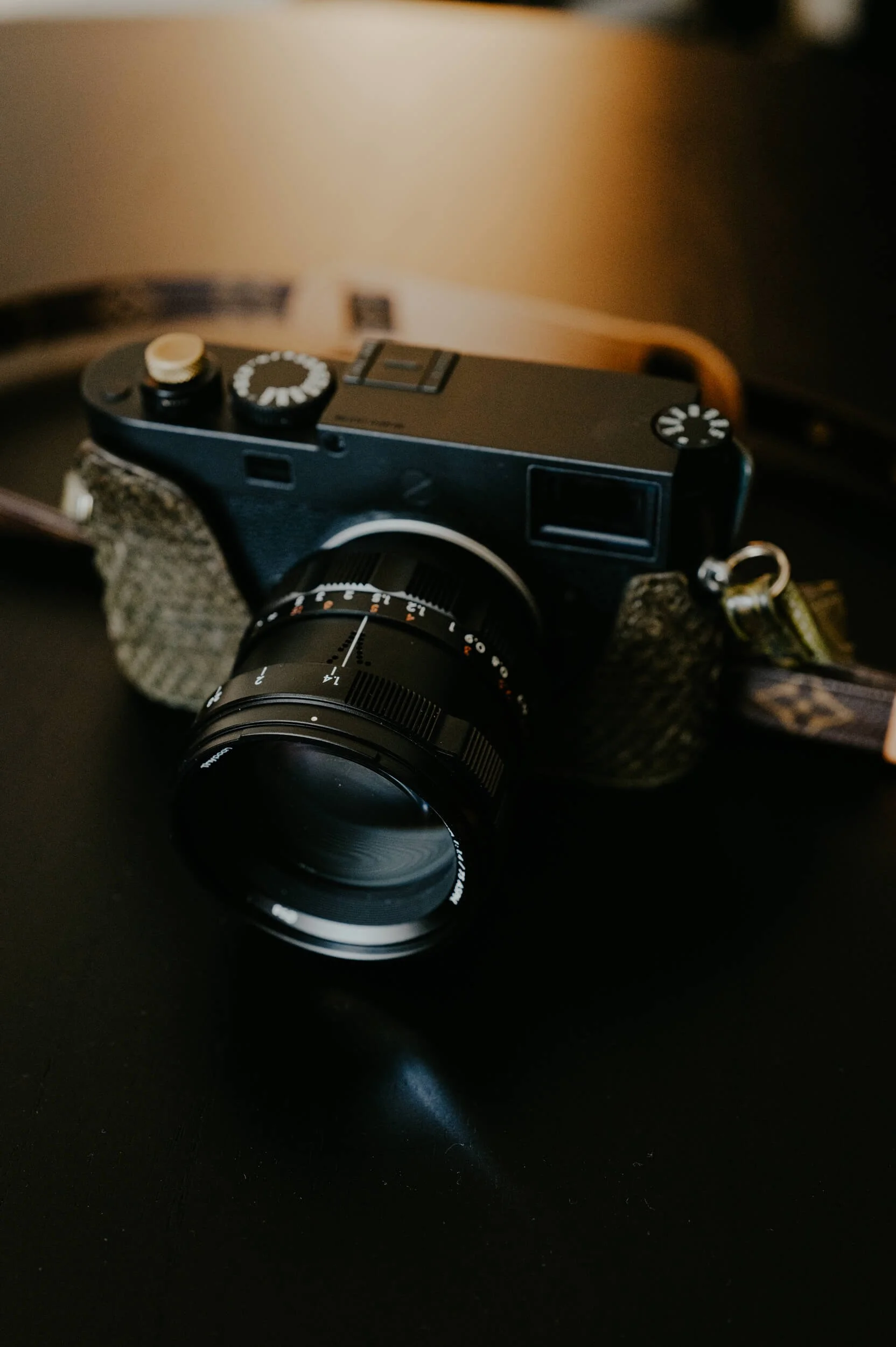 Thypoch Simera 75mm f/1.4 lens mounted on a Leica M11 Monochrom, photographed by Milan Swolfs.