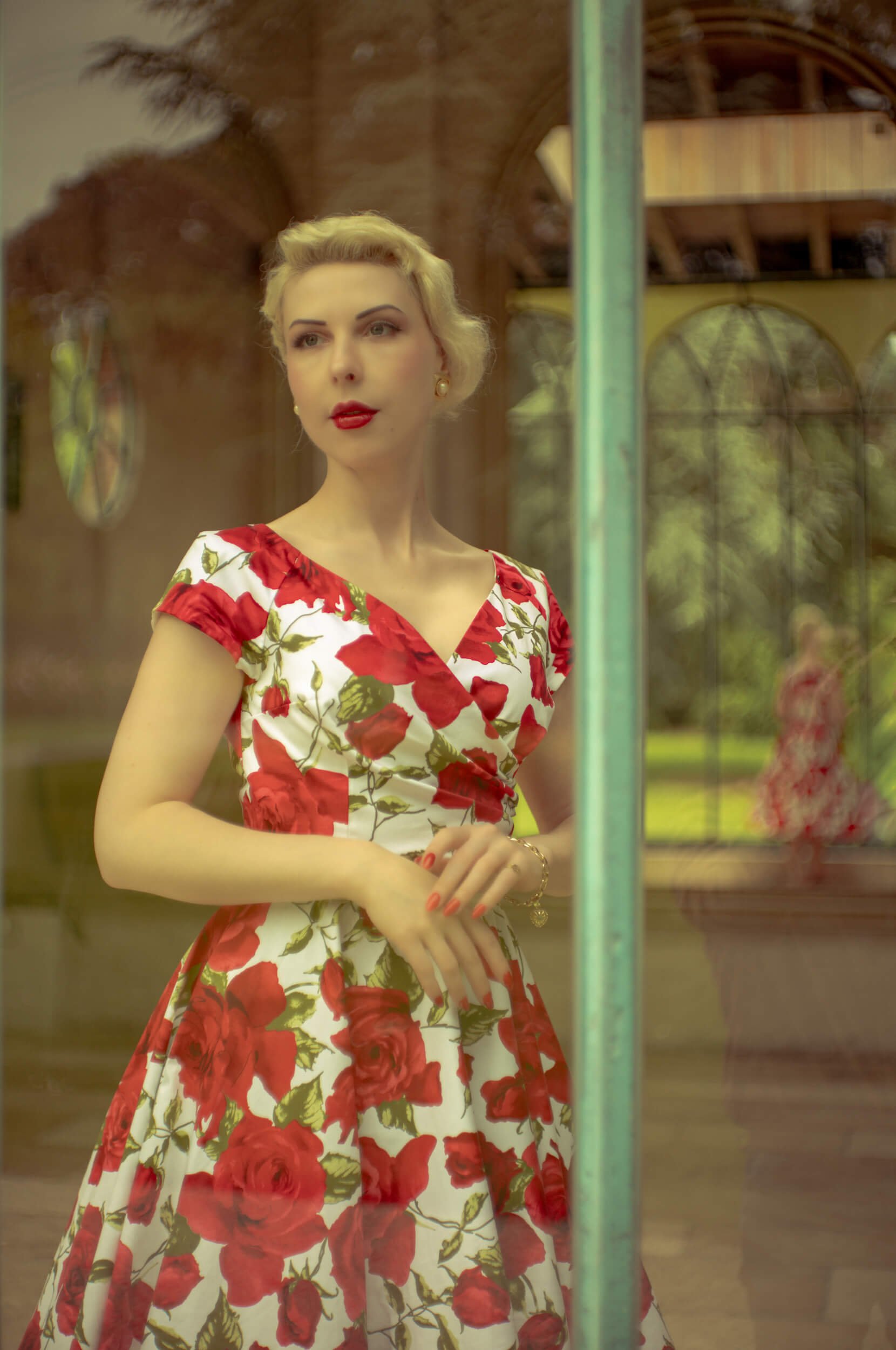 Yulia photographed through the glass of the Orangerie at Kasteel Belvedere with the Light Lens Lab 50mm f/1.9 Rigid-ZS6.