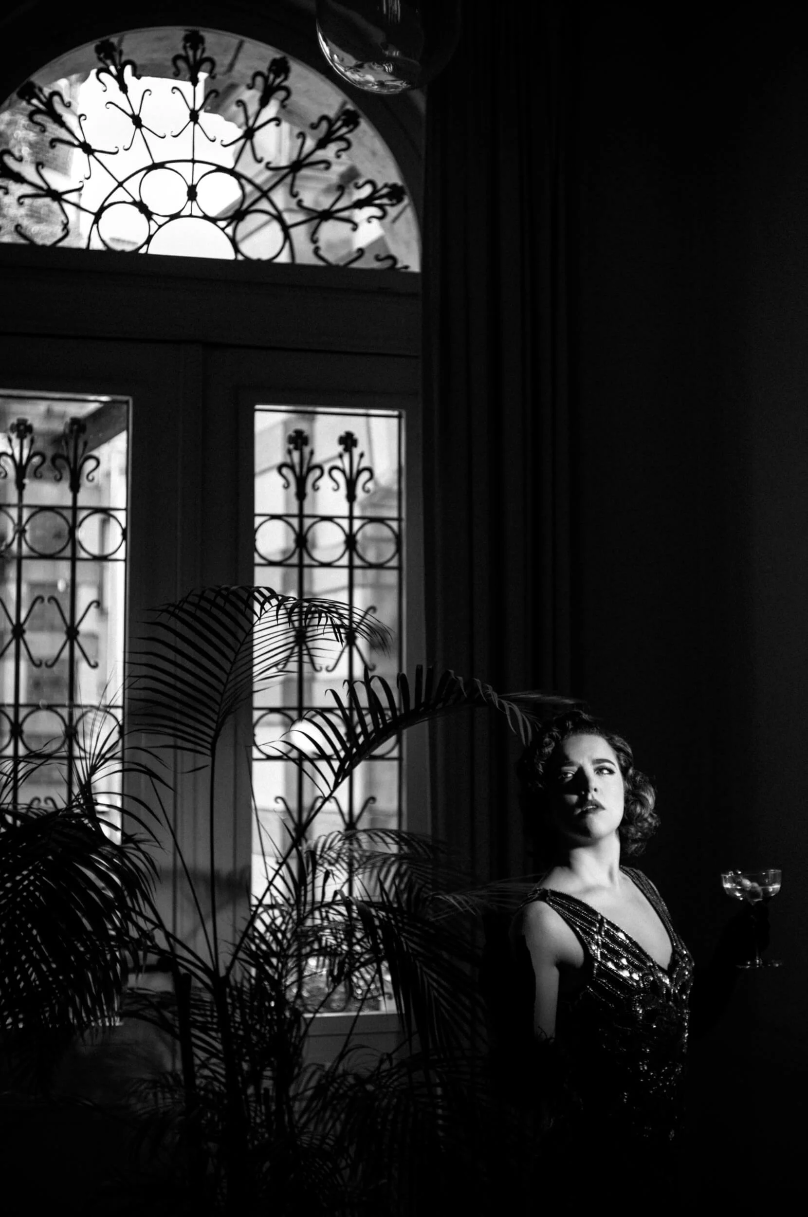 Jennifer photographed with the Leica M11 Monochrom and Light Lens Lab 50mm f/1.9 Rigid-ZS6 using dramatic Art Deco inspired lighting.