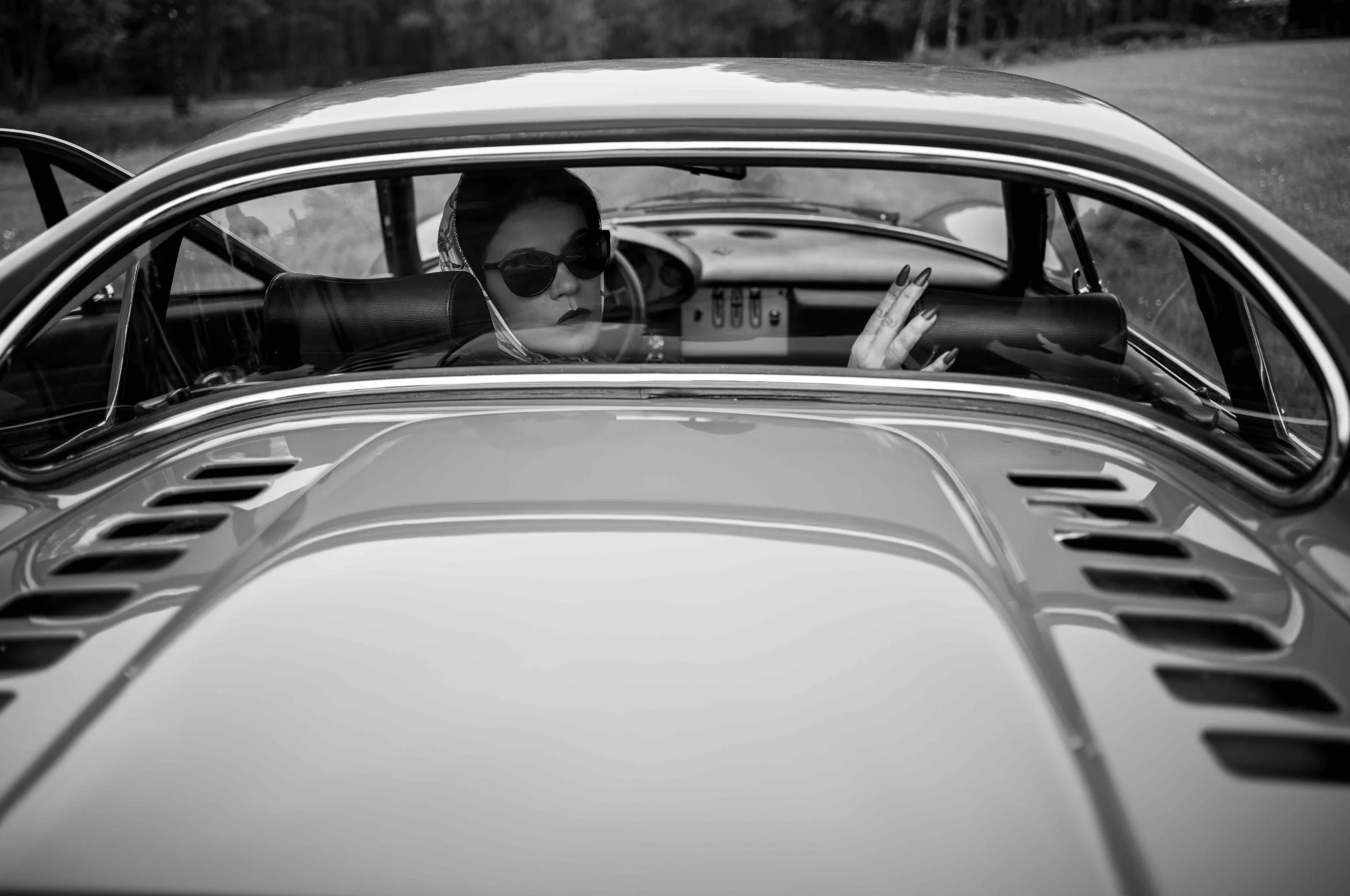 Caroline in a Ferrari Dino, photographed with the Leica M11 Monochrom and Summicron-M 28mm f/2