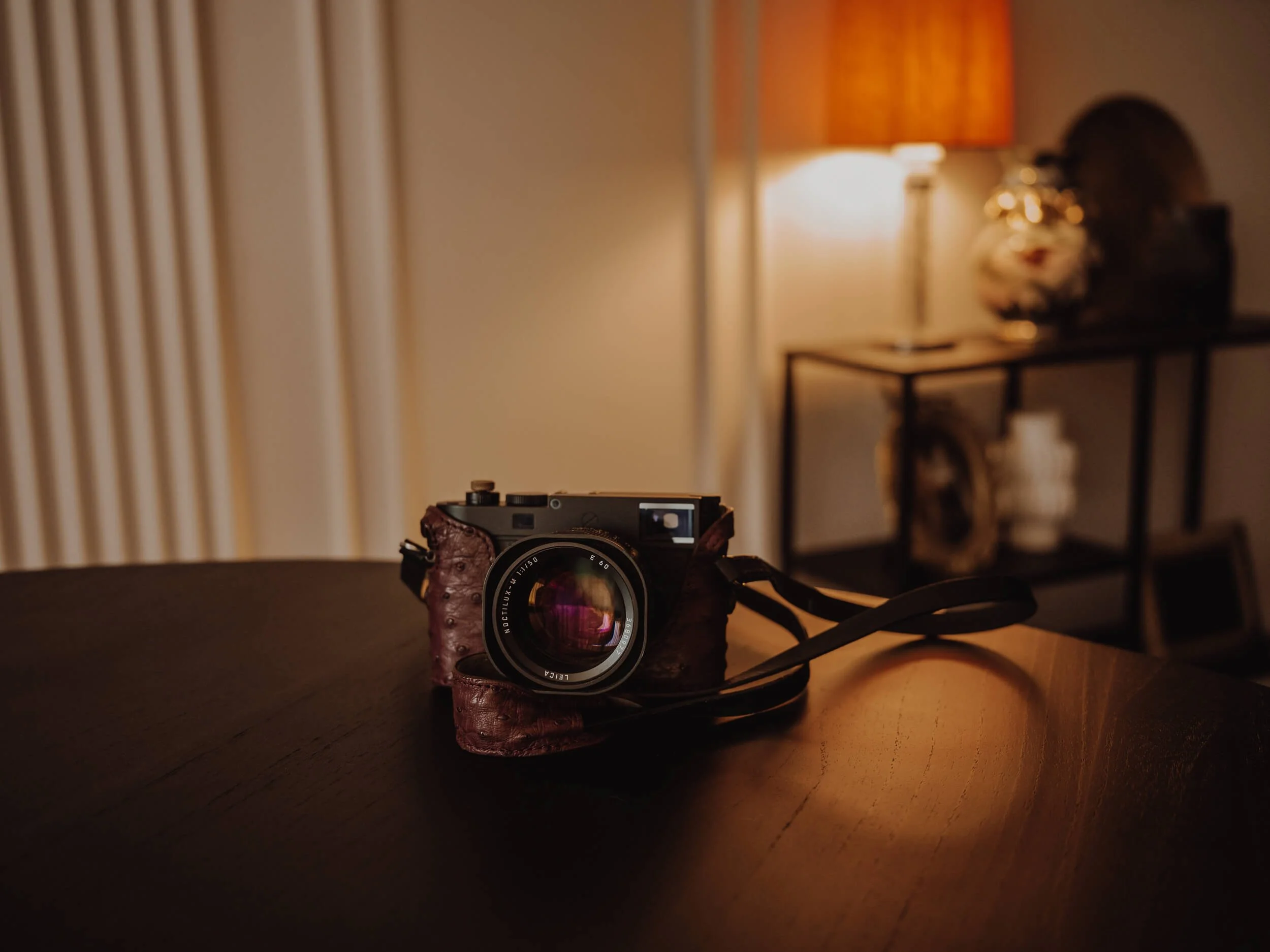 Leica M11 Monochrom with Noctilux 50mm f/1 v4 and Angelo Pelle ostrich leather case product shot by Milan Swolfs