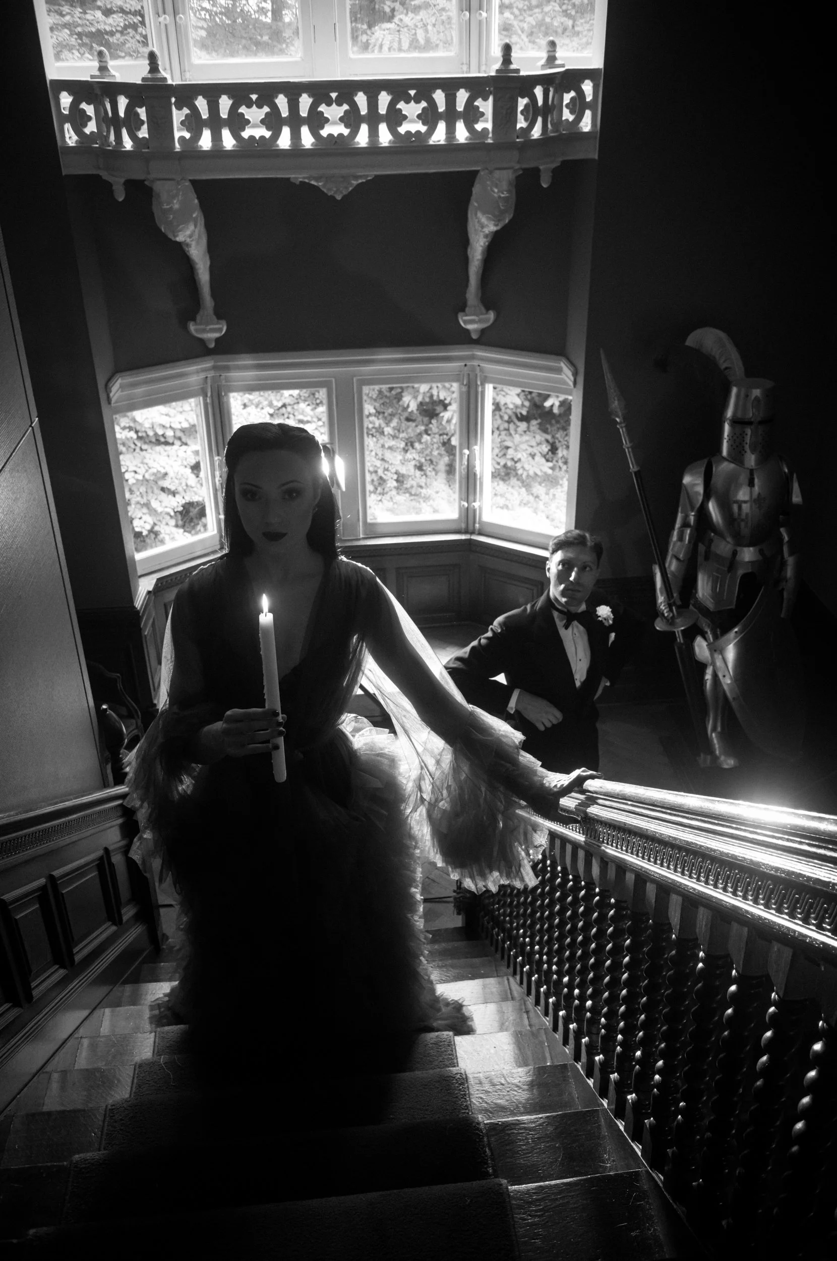 Lune Mortelle and Lauro photographed on a castle staircase with the Leica M11 Monochrom and Summaron-M 28mm f/5.6