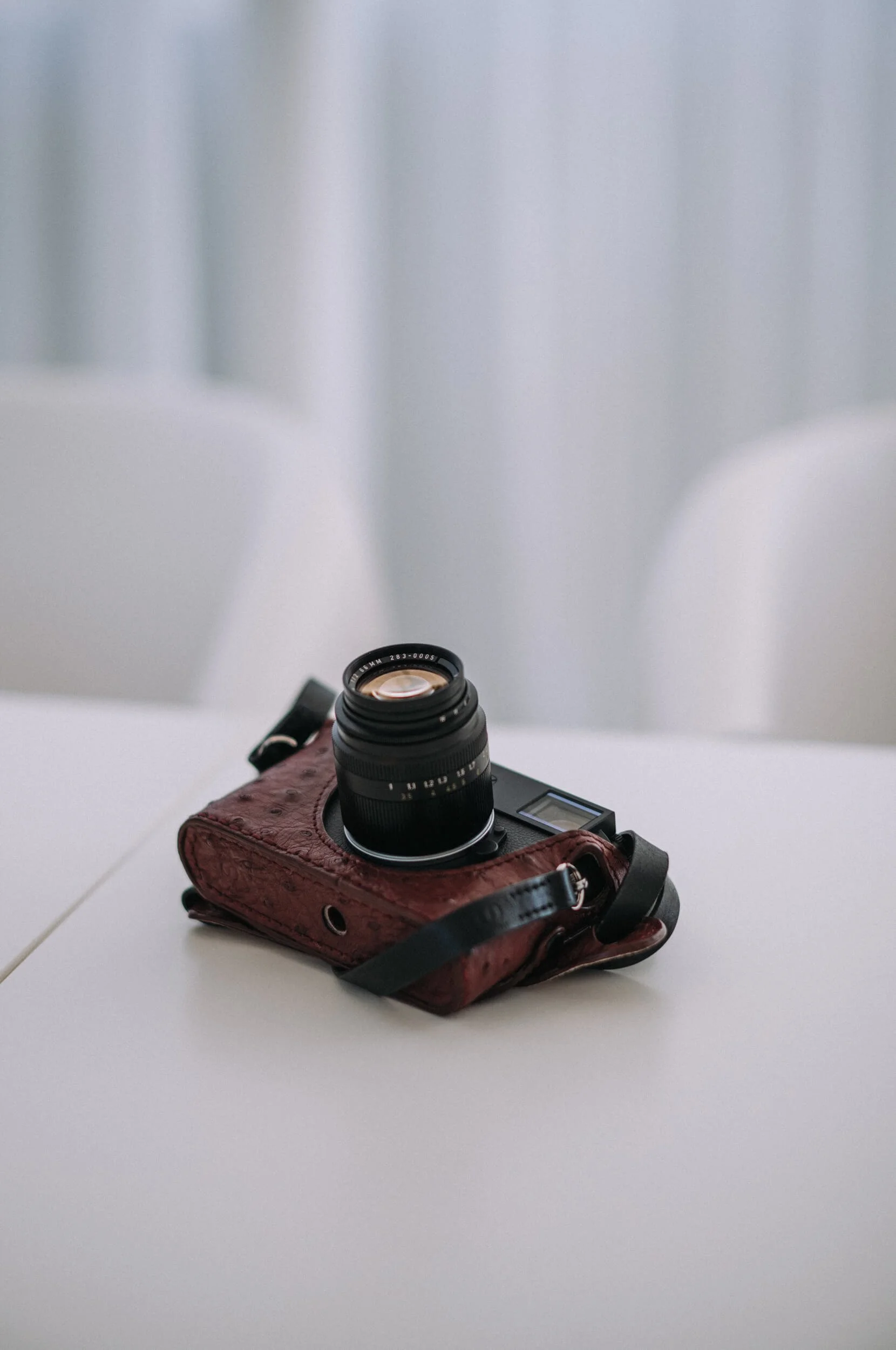The original ELCAN 66mm f/2 mounted on a Leica M11 Monochrom, photographed with the new Leitz Summicron-M 66 f/2.