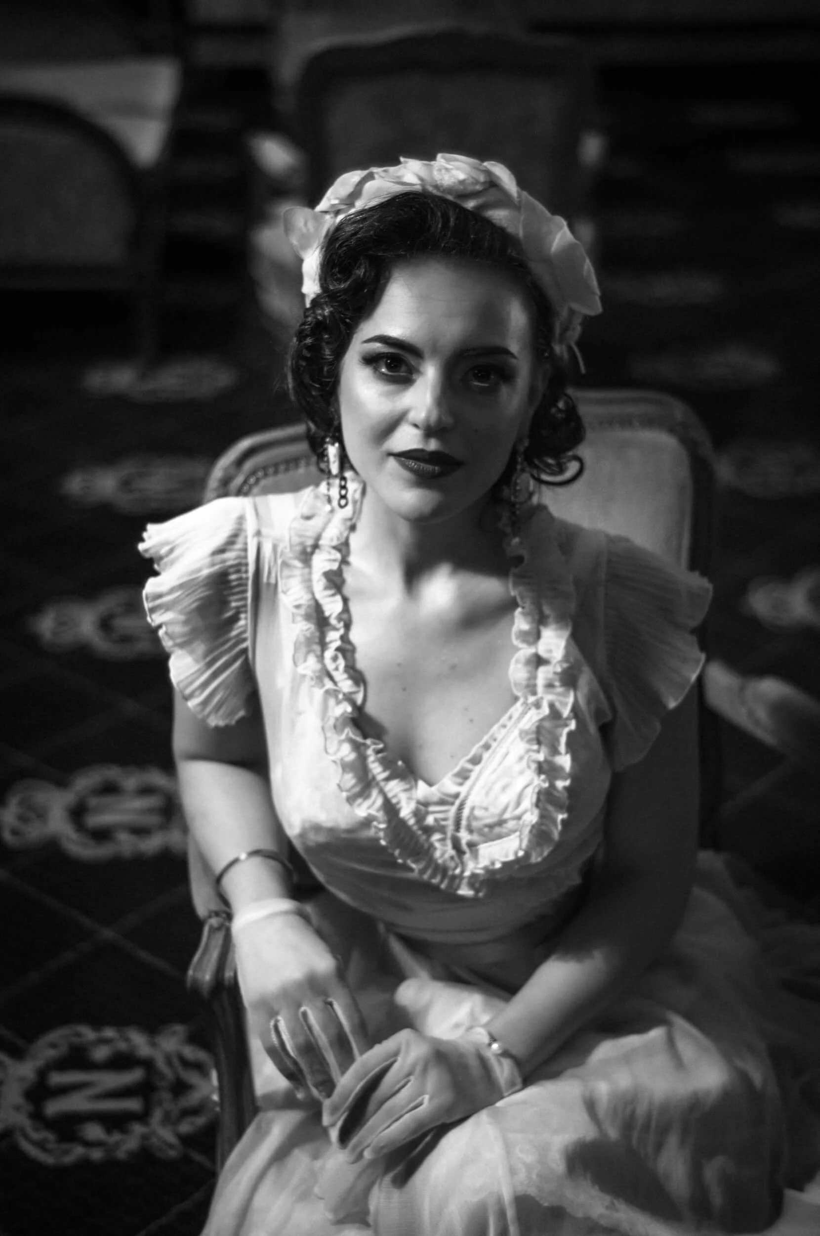 Classic black and white portrait photographed with the Omnar Bertele 50mm f/2 showing soft tonal rendering and gentle glow