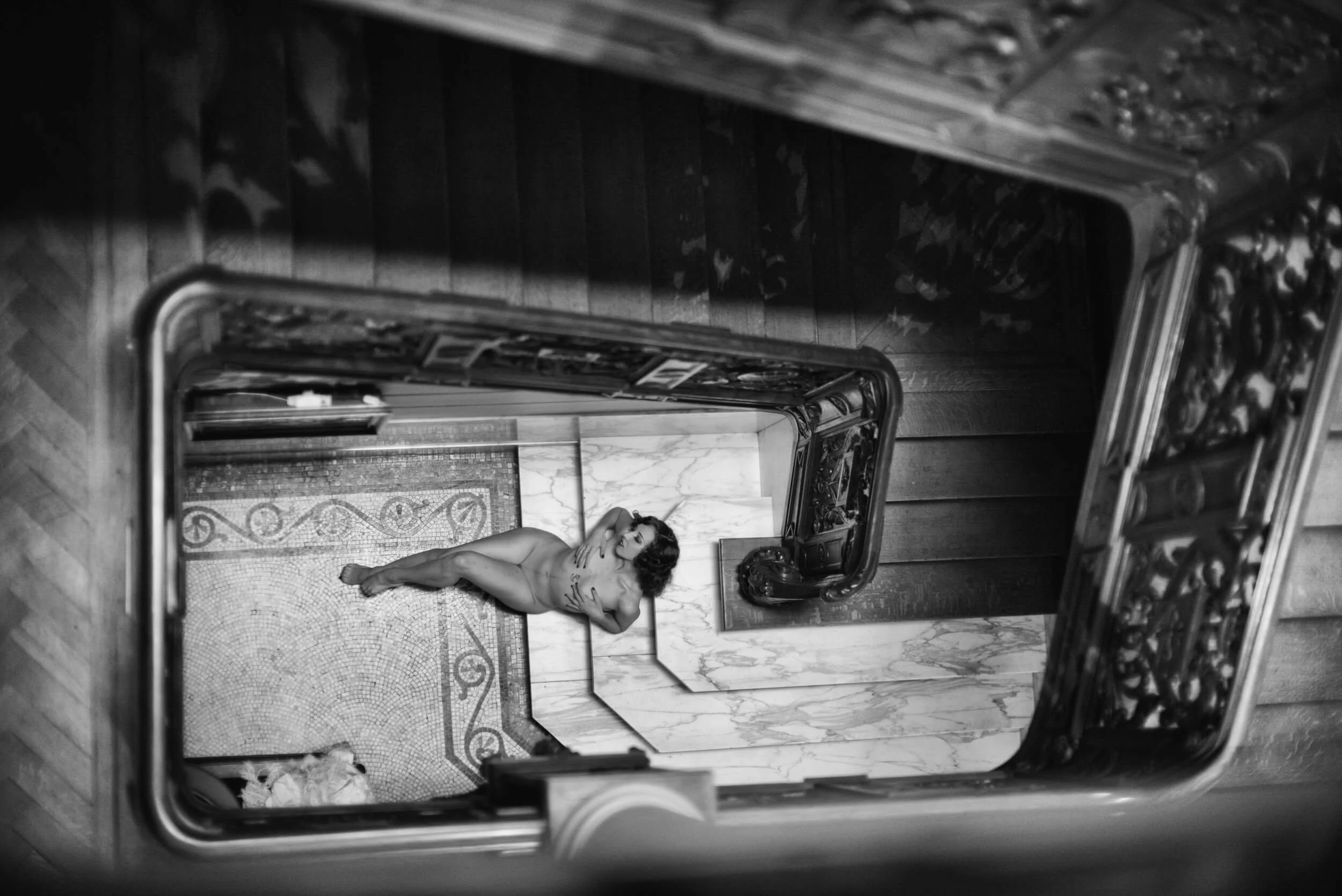 Chanelle photographed through a stairway with the Leica M Monochrom Typ 246 and Noctilux 50mm f/0.95
