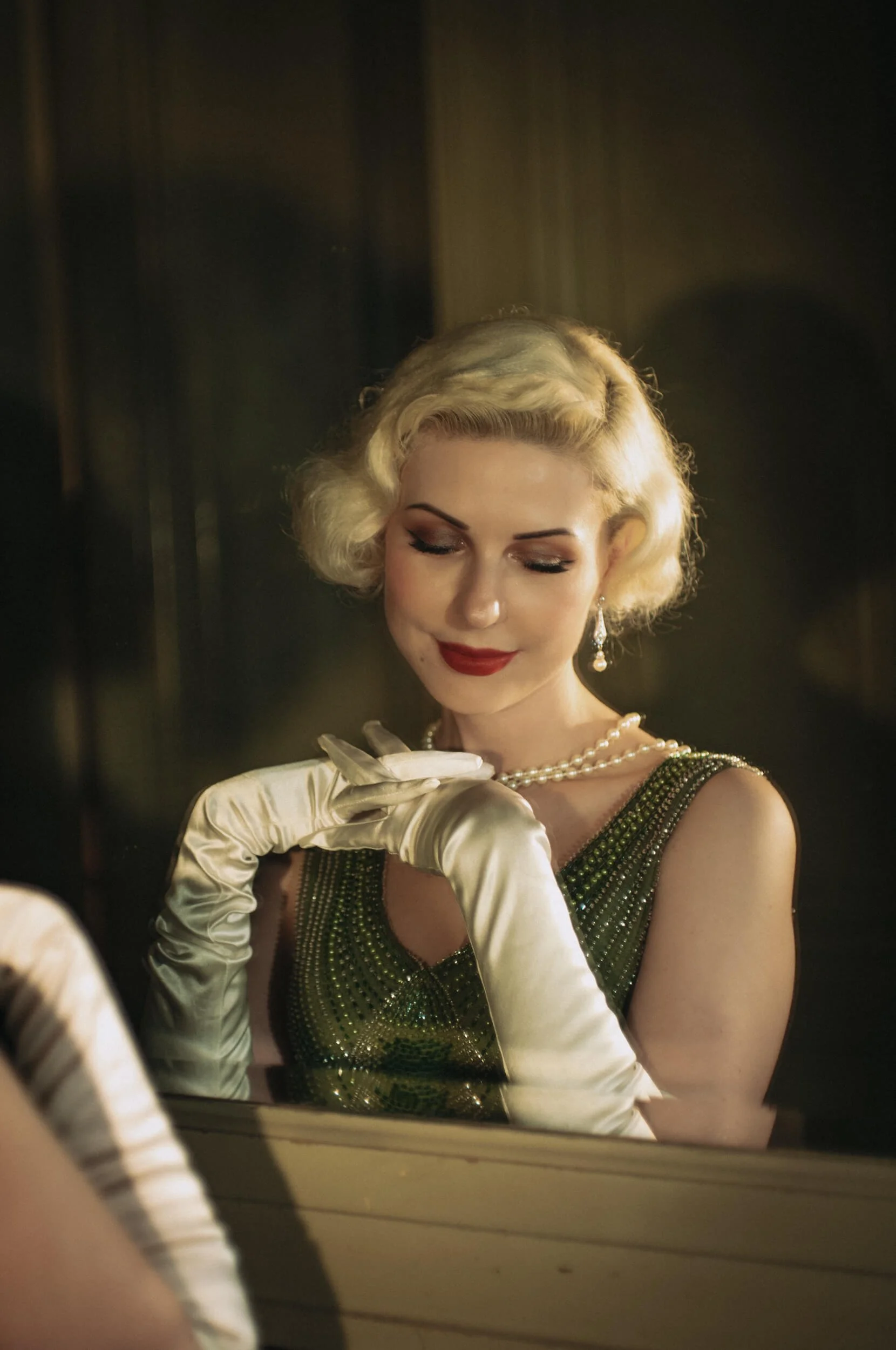 Yulia photographed through a mirror with the Light Lens Lab 50mm f/1.9 Rigid-ZS6, showcasing the lens's glow, tonal transitions and vintage rendering.
