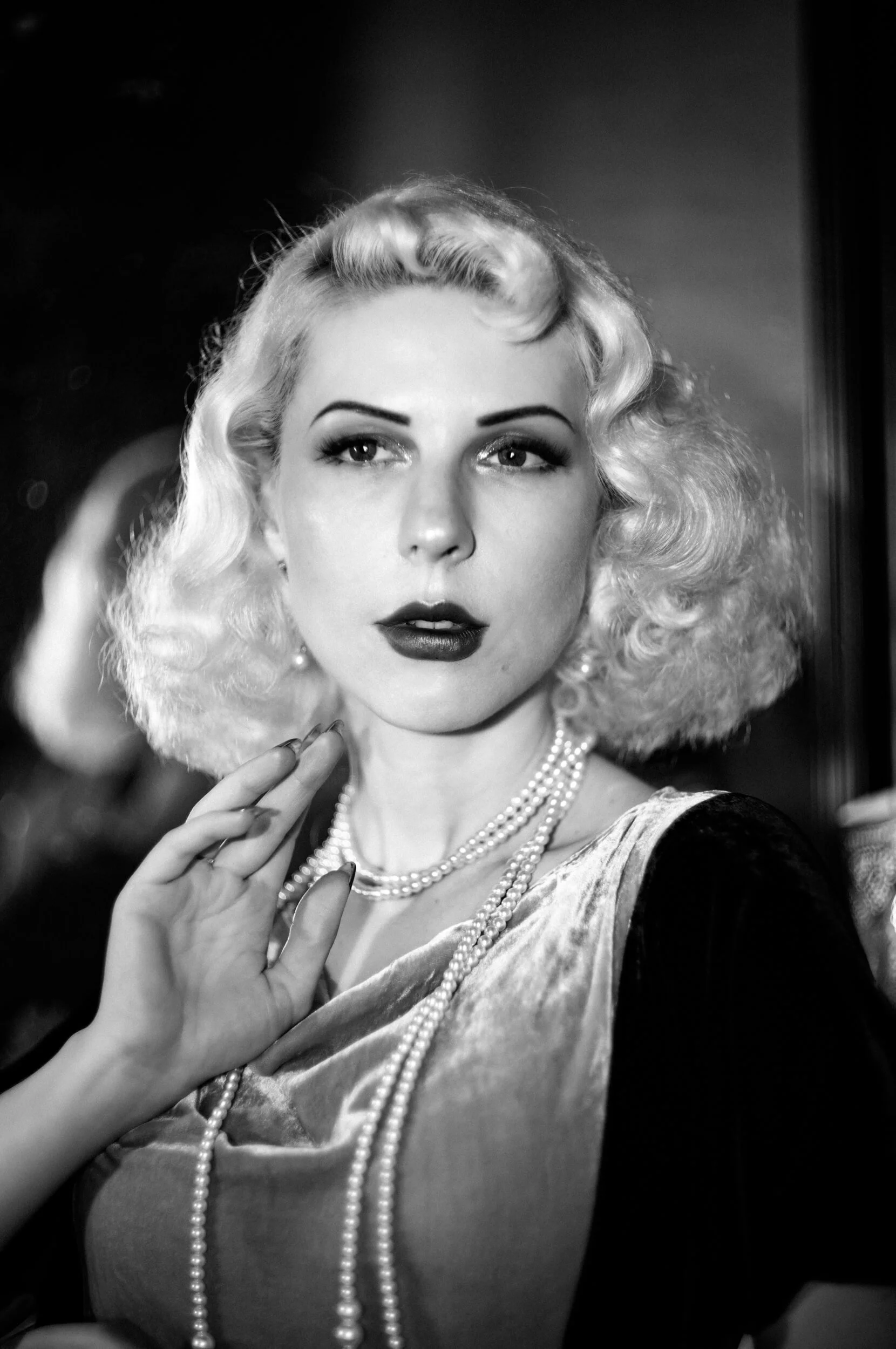 Classic monochrome portrait of Yulia photographed with the Light Lens Lab 75mm f/1.5 Z21