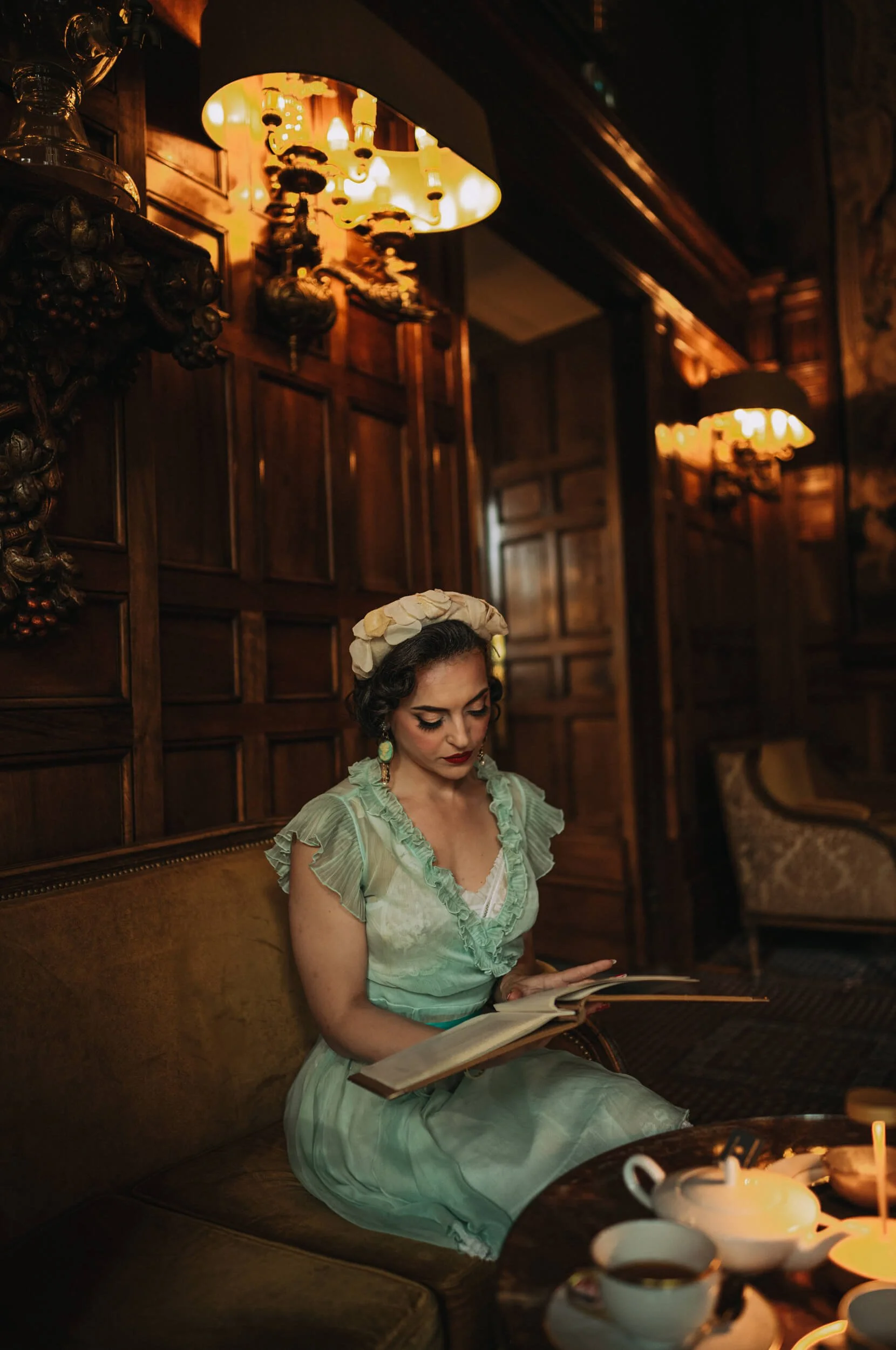 Letizia reading menu at Hotel Negresco bar shot with Thypoch Simera 28mm f/1.4 II Leica M11-D