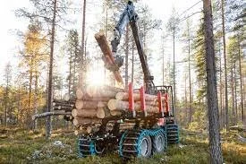 Forestry machine loading logs in a forest