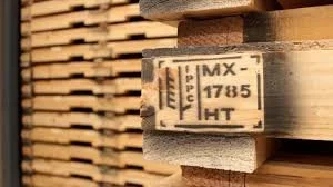 Wooden pallets stacked with a close-up of a stamped pallet displaying codes, including "MX 1785 HT."