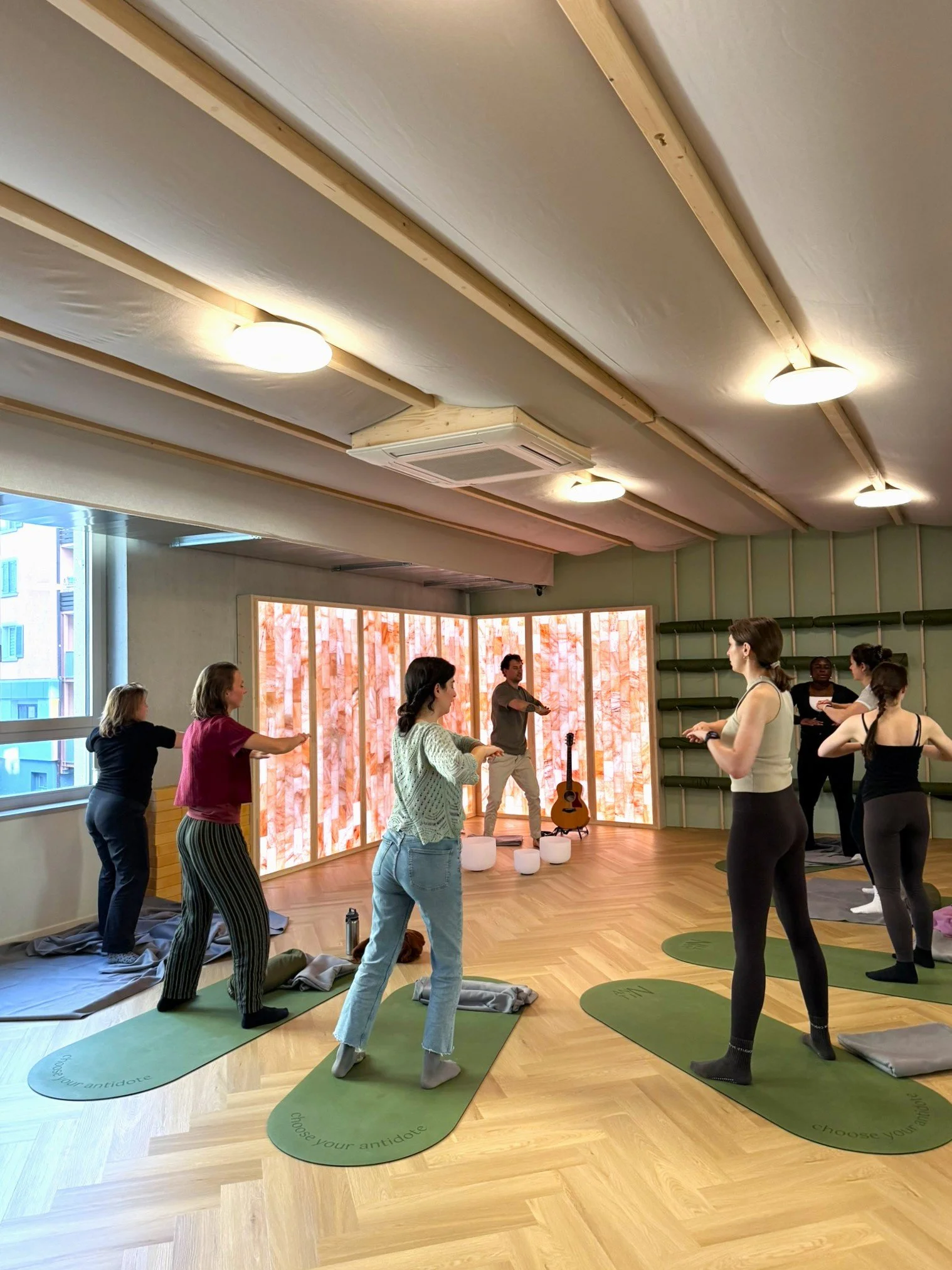 Standing movement and dynamic breathing exercises during a breathwork event at ANNTIN studio in Opfikon