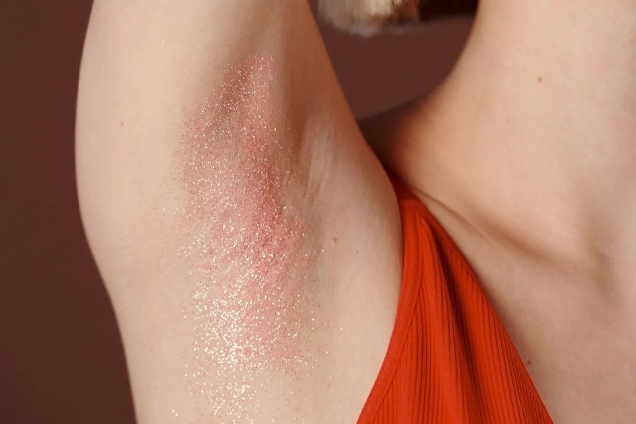 Close-up of an underarm showing mild redness and sensitivity