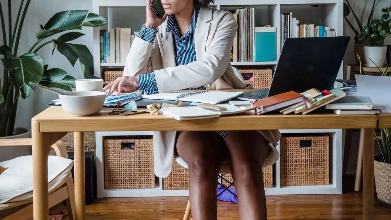 Busy woman working from home